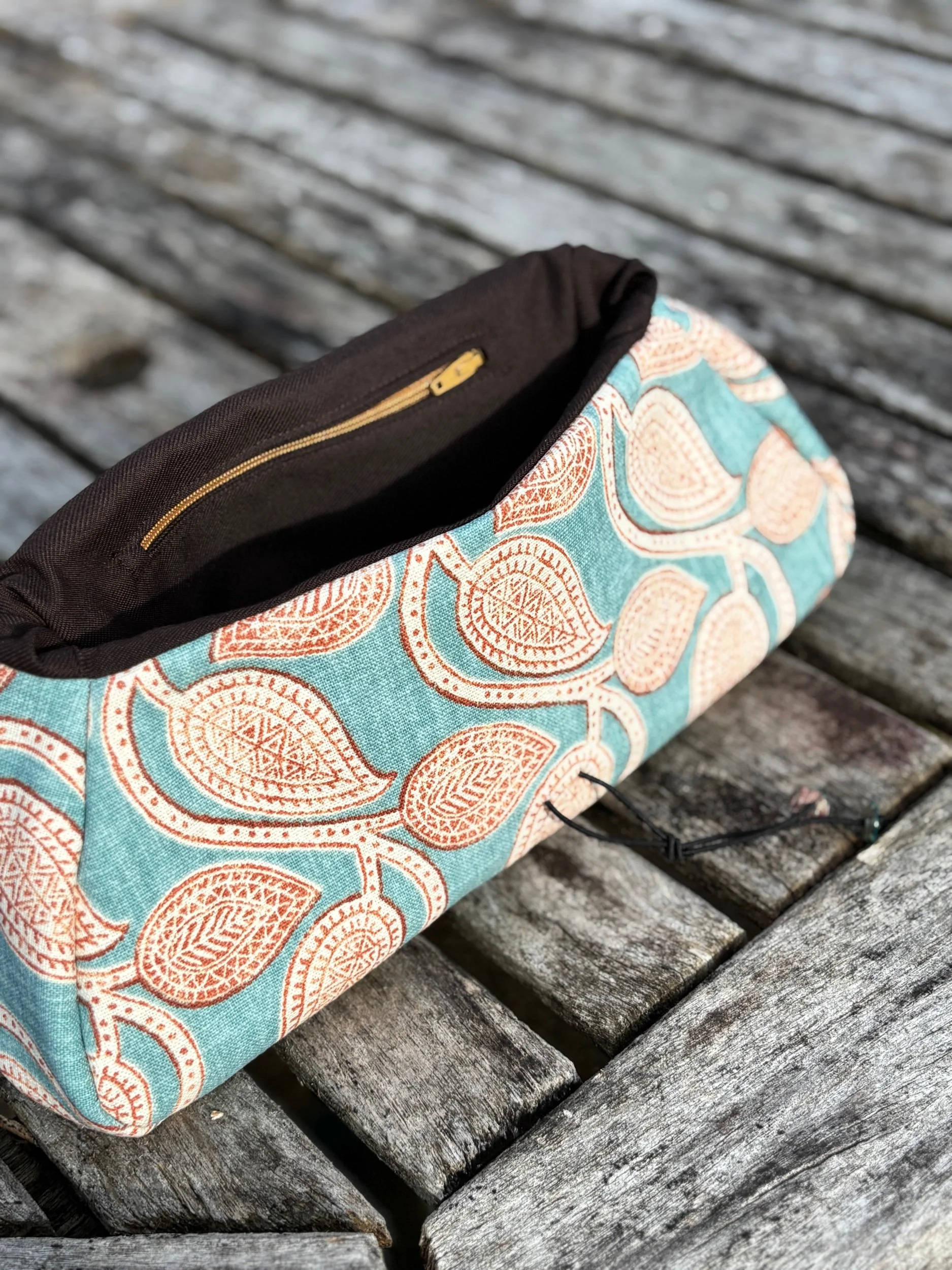 Interior of handmade clutch bag with lining and zip pocket sustainable cotton purse