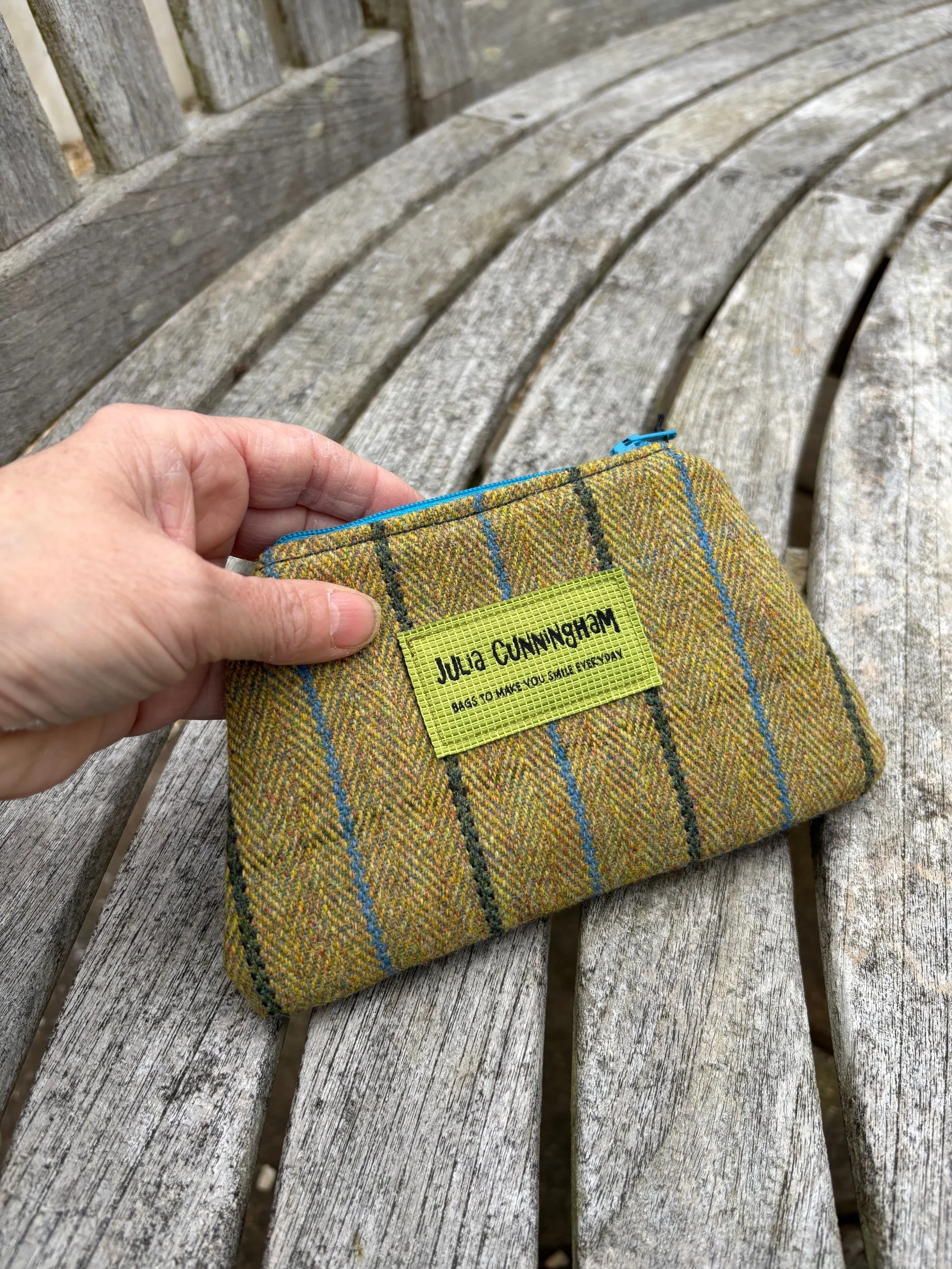 Scottish tweed coin purse in striped pattern, front-facing image