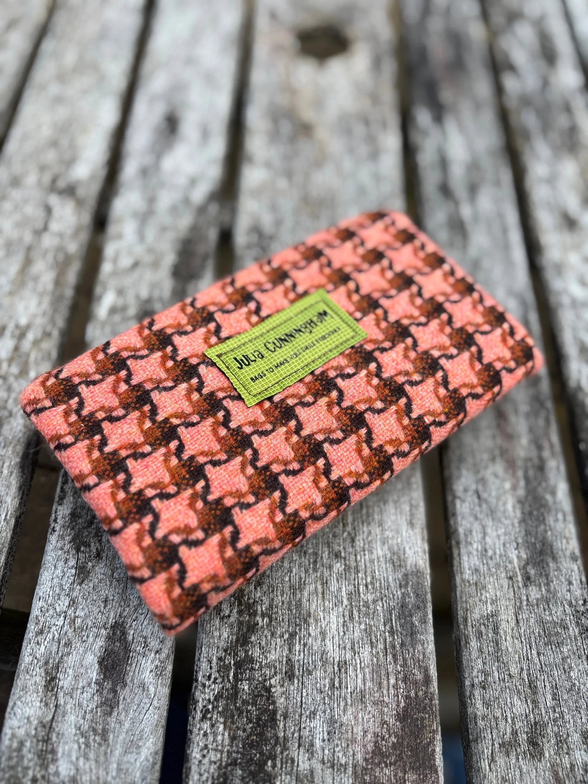 Back view of handmade peach tweed clutch bag featuring Julia Cunningham designer label