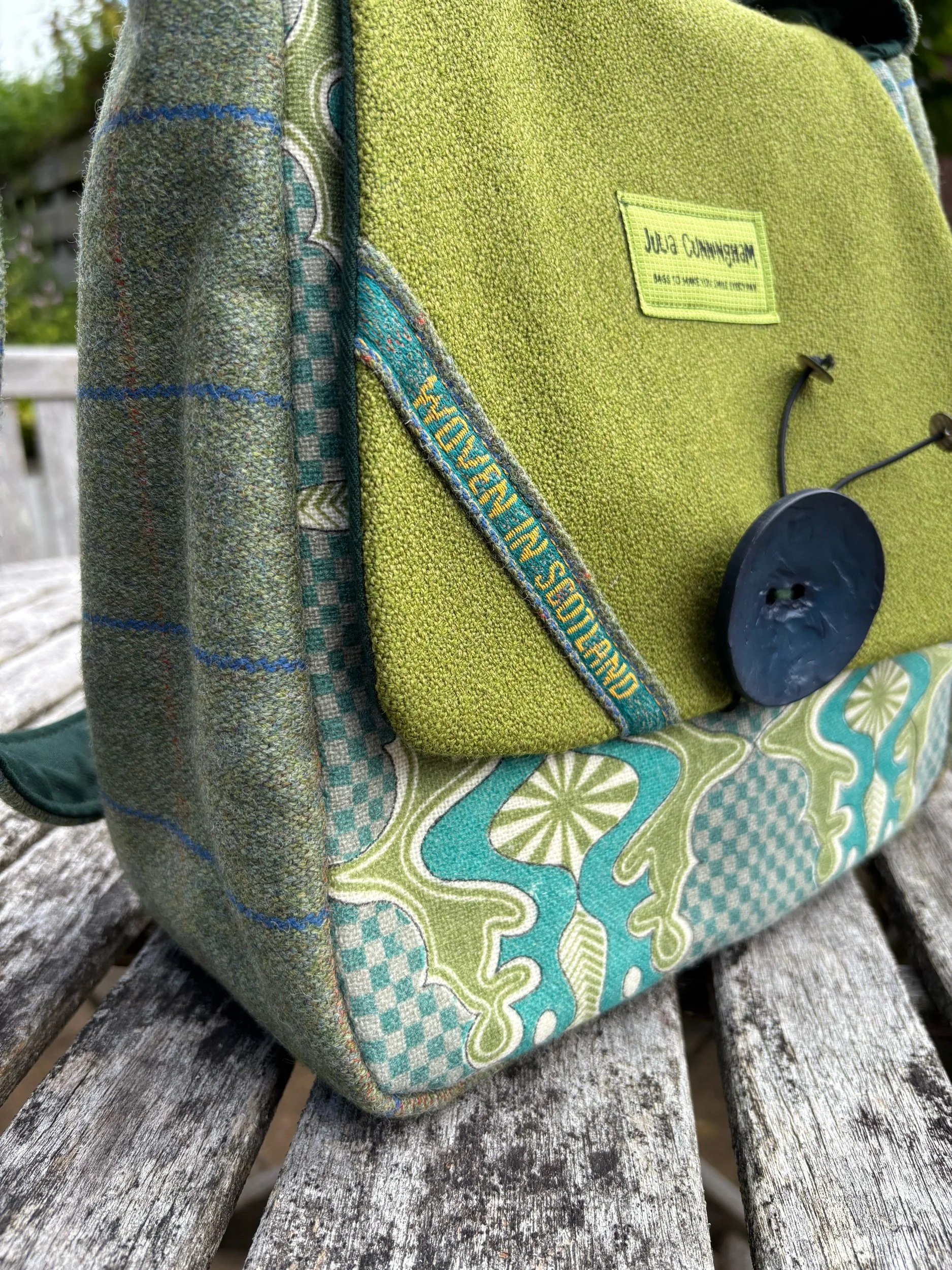 Detailed view of Bute tweed flap with selvedge woven in Scotland