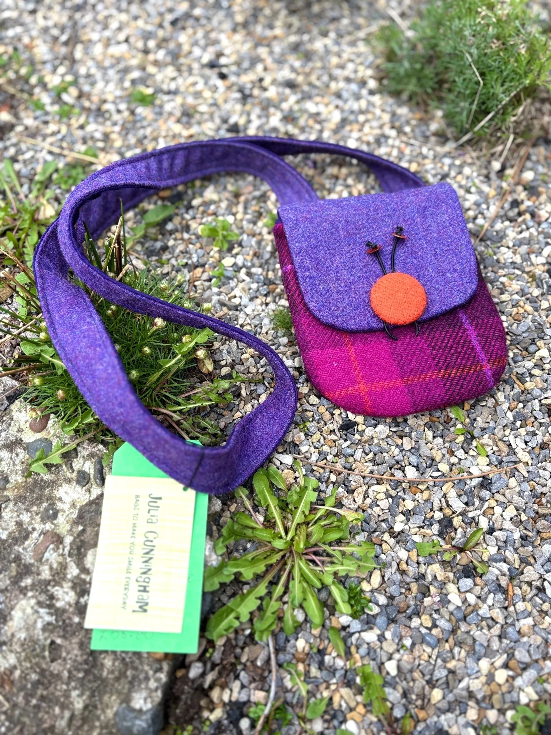 Handmade purple and orange Harris tweed crossbody phone bag with purple flap closure, crafted in Scotland by Julia Cunningham