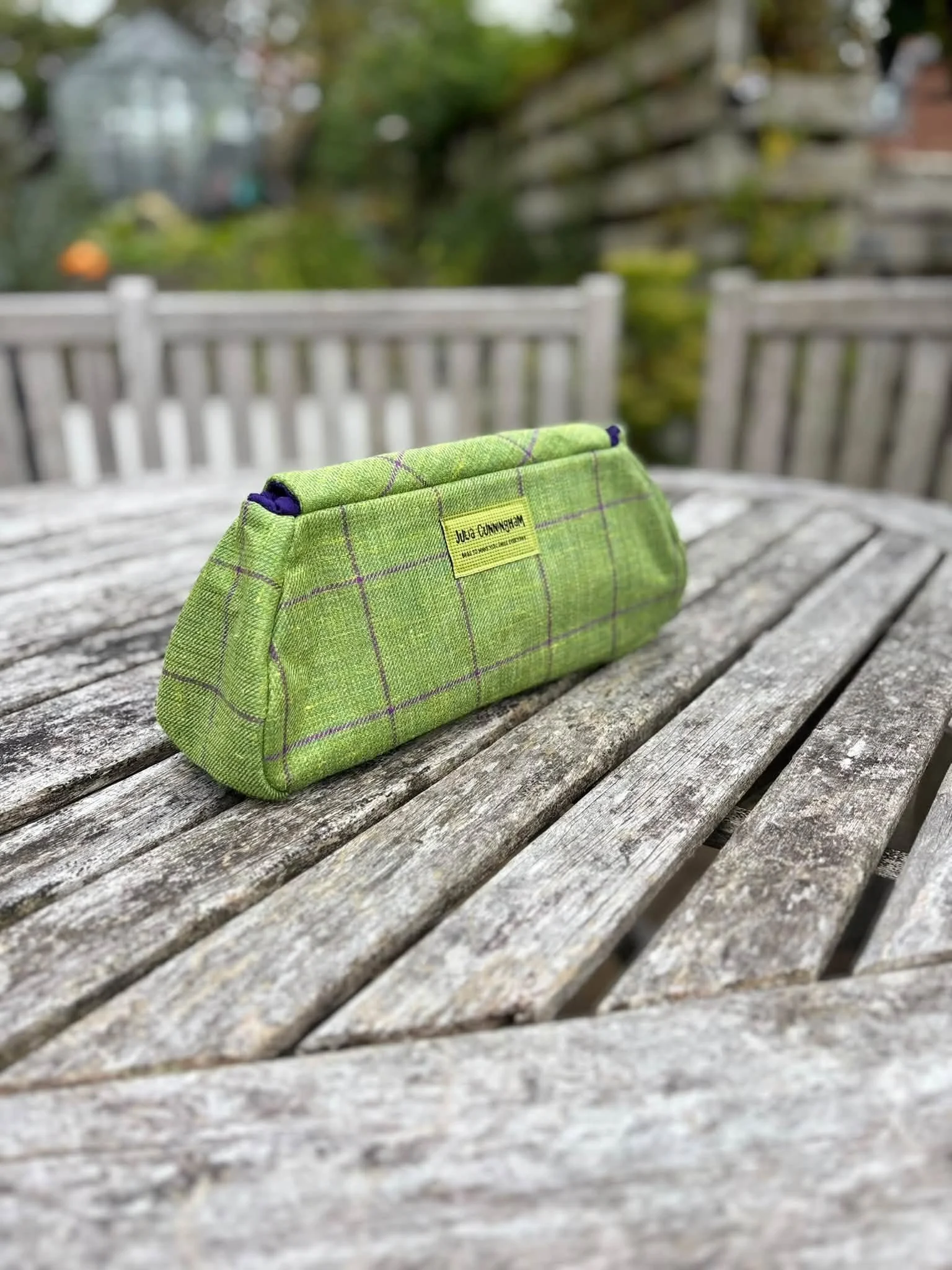 back view of green and purple peerie poak clutch bag.jpg