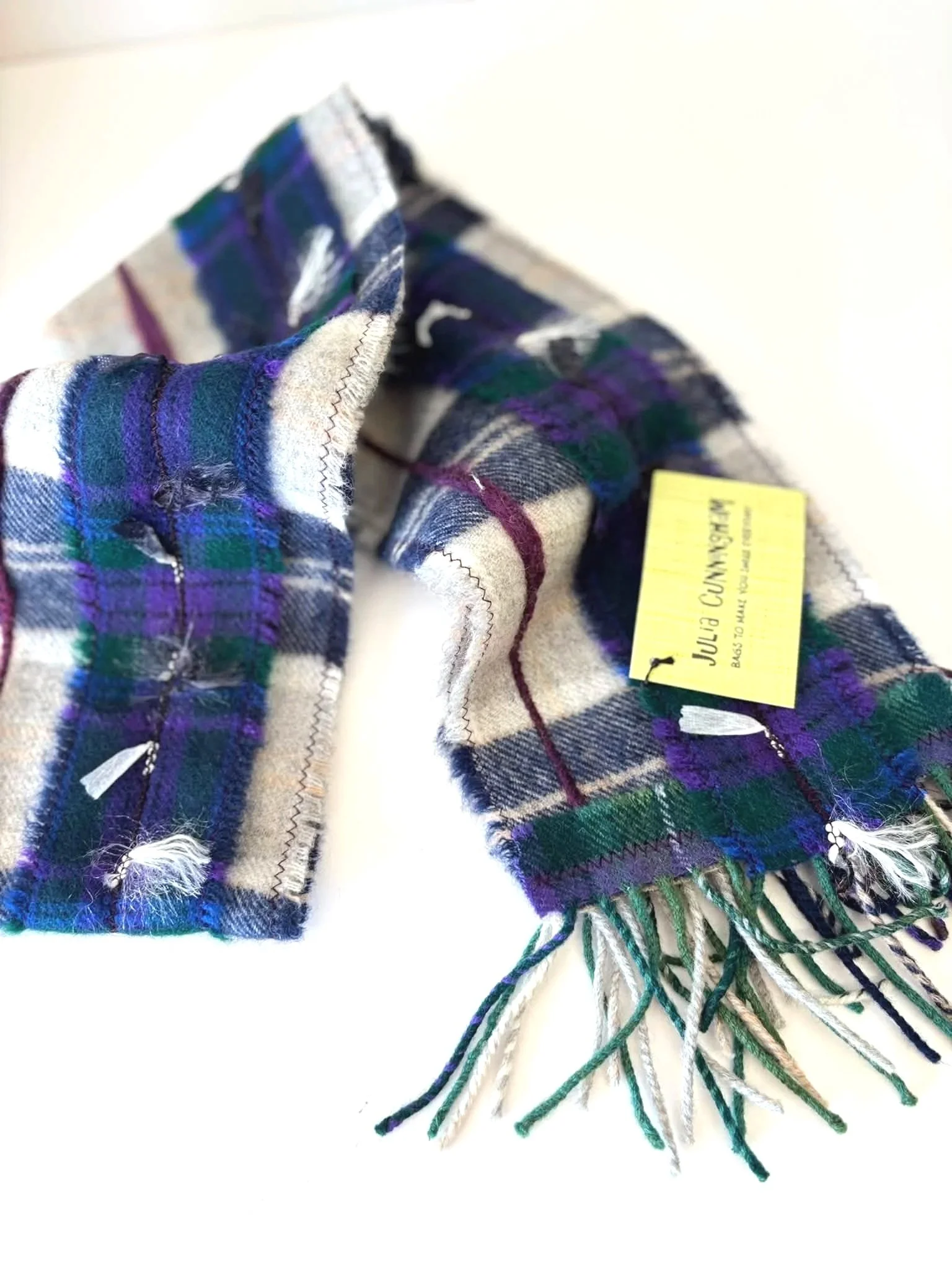 Double fringe detail on a handmade wool scarf