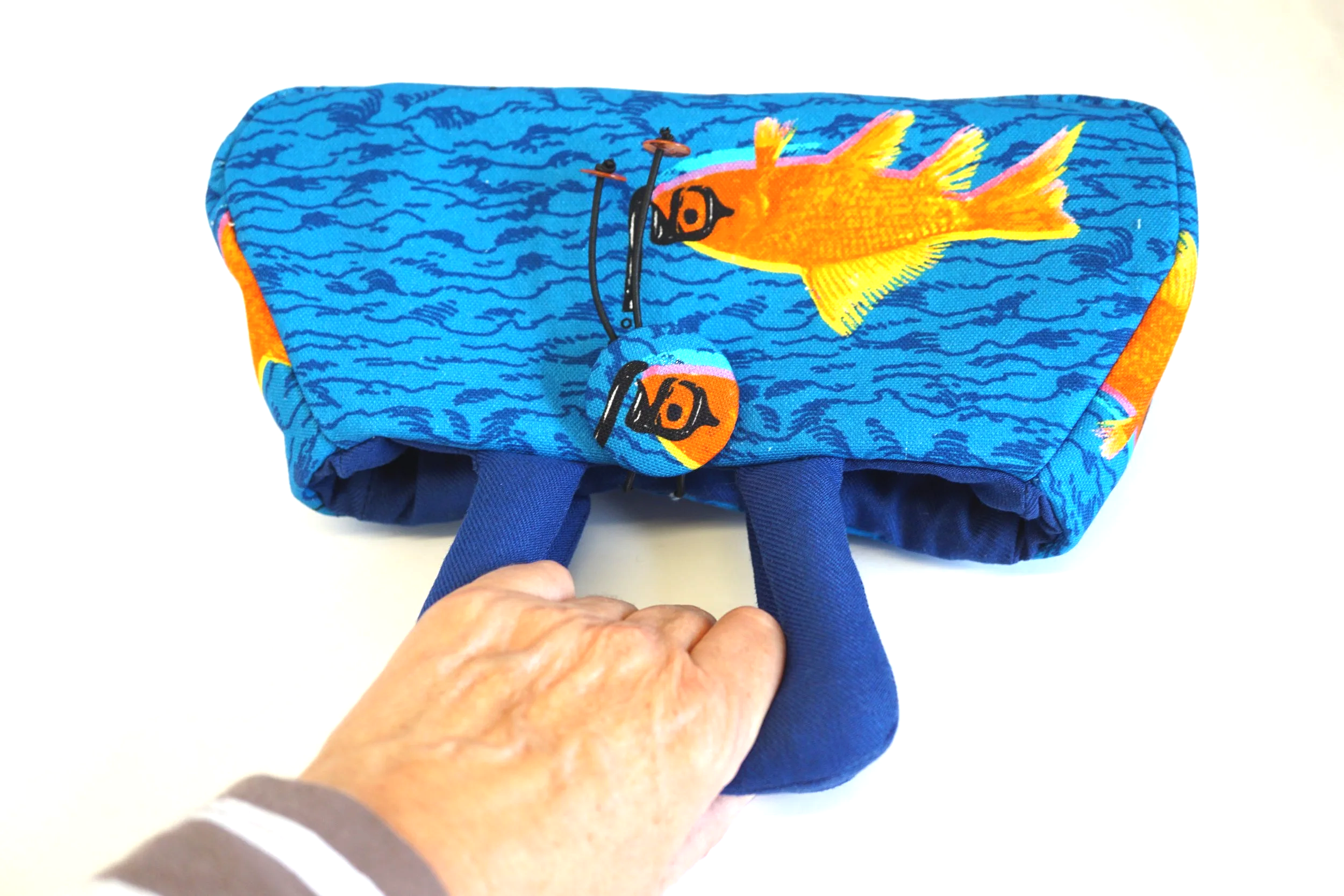 How+a+hand+fits+inside+the+handles+of+a+wee+fantoosh+by+Julia+Cunningham.png