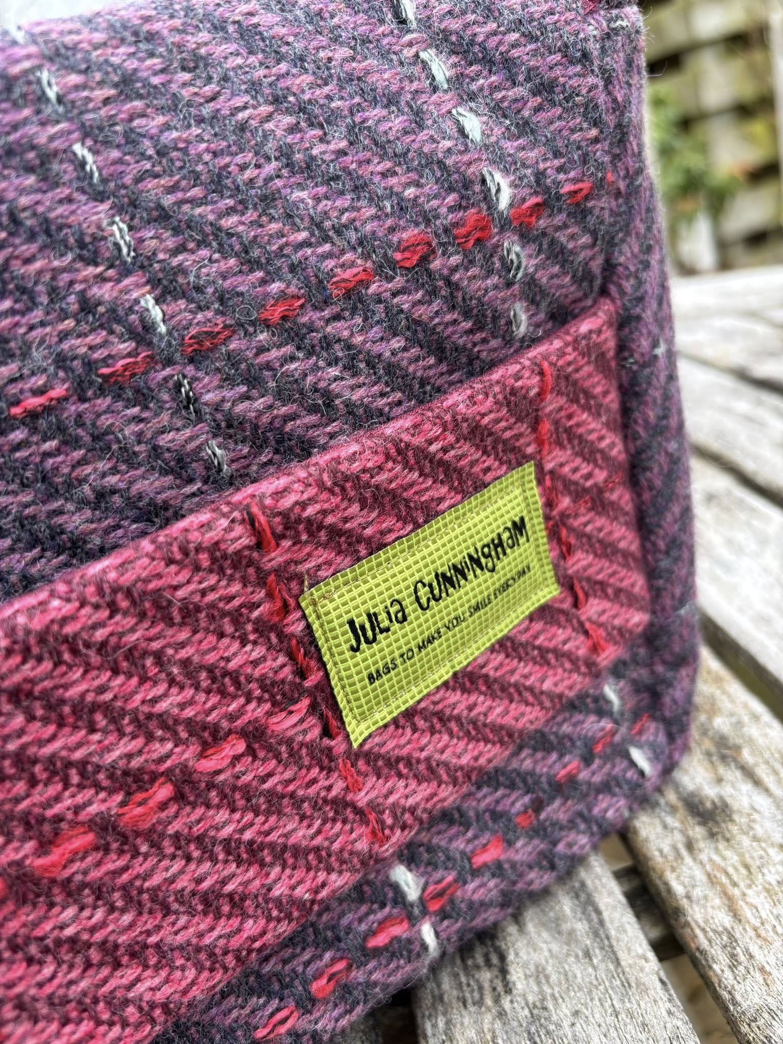 Fabric detail of handmade Scottish crossbody bag in vintage pink tweed