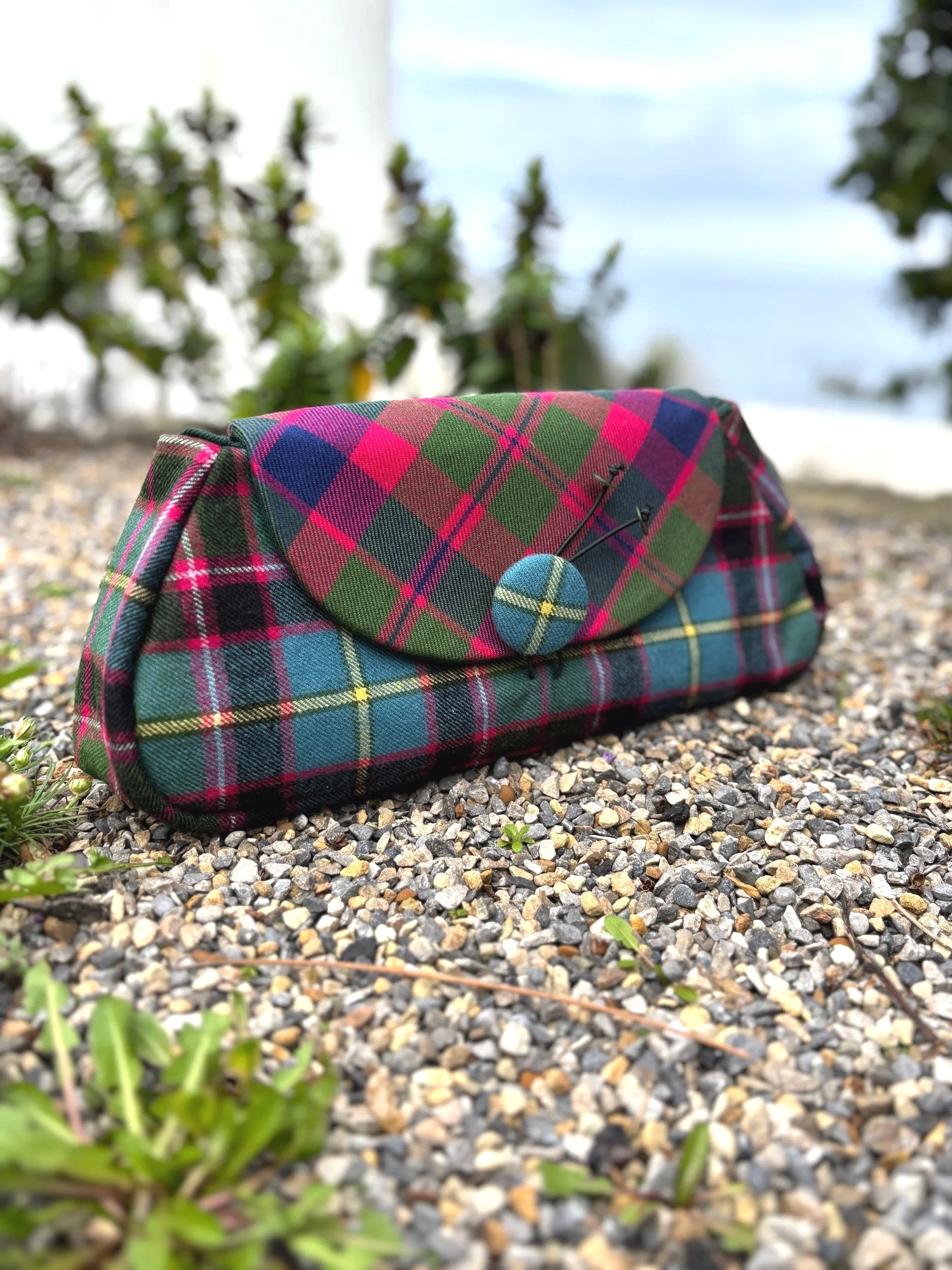 Handmade Scottish clutch bag in Stirling and Bannockburn tartan with bias cut Glasgow tartan flap, made by Julia Cunningham