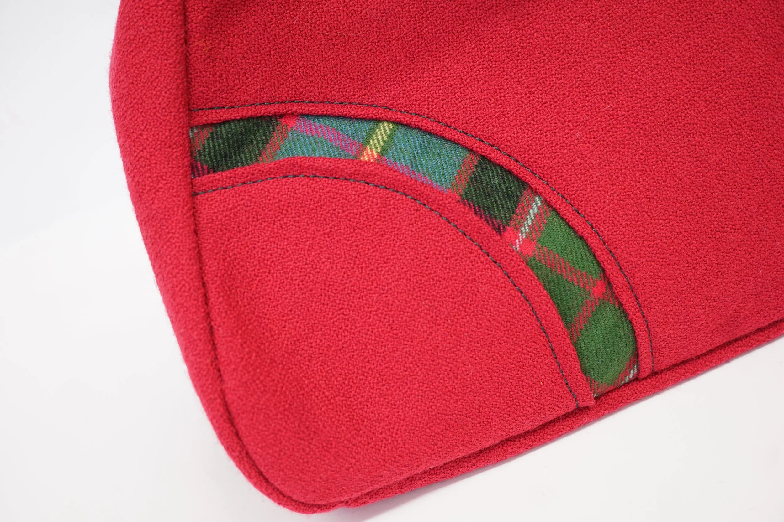 Close-up of pink Bute tweed and tartan panel on handmade Scottish handbag