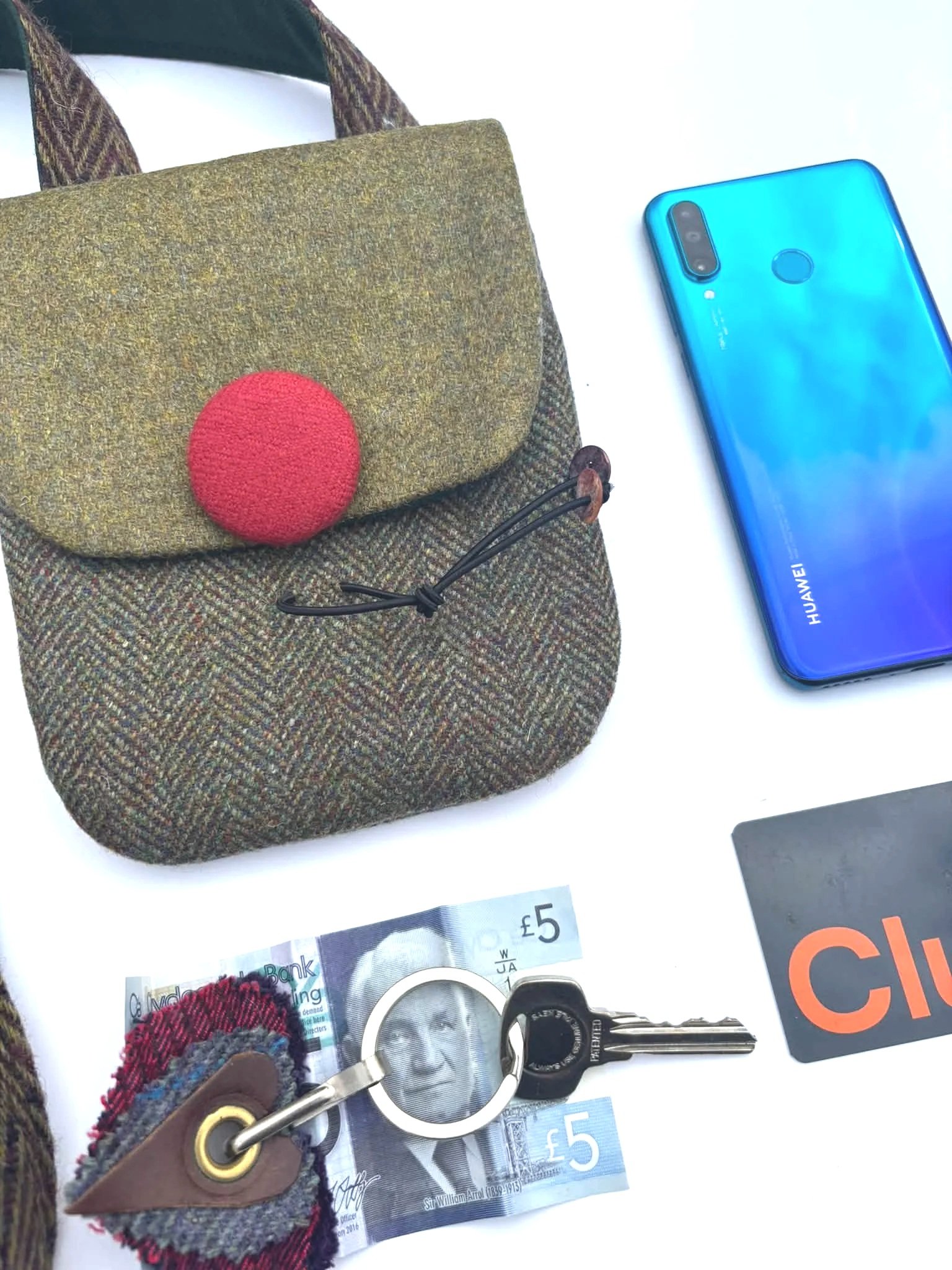 what+can+i+get+insode+a+tweed+phone+bag+by+Julia+Cunningham.jpg