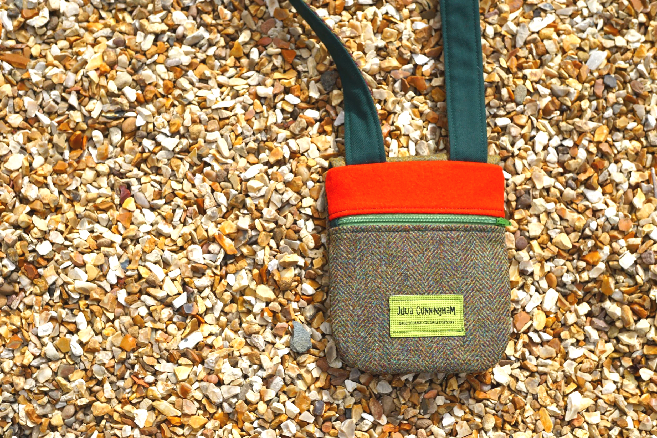 Back of the cross body phone bag showing orange panel