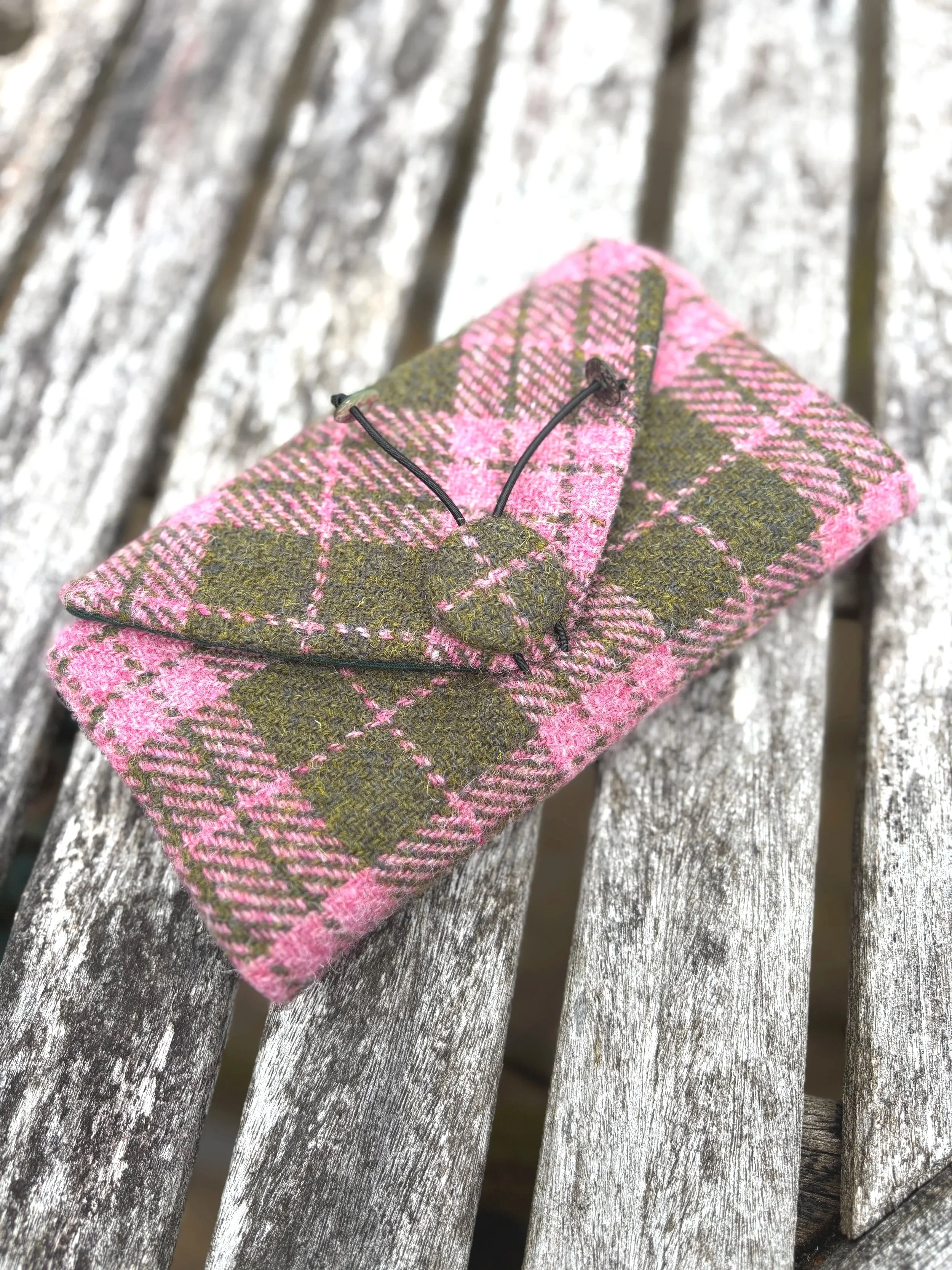 Scottish harris tweed clutch bag in pink and olive