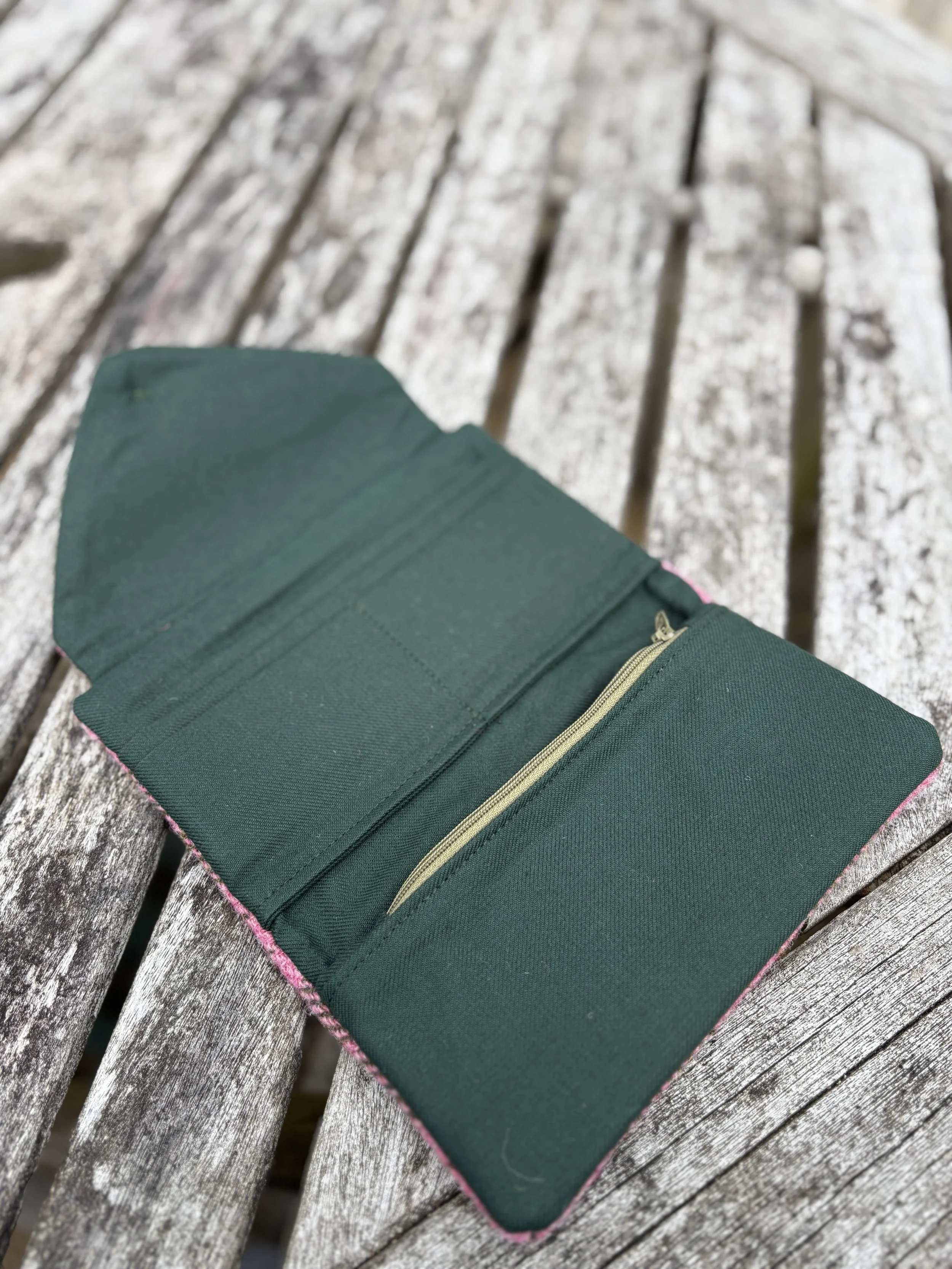 in side view of Julia Cunninghams clutch bags shoeing all the pockets