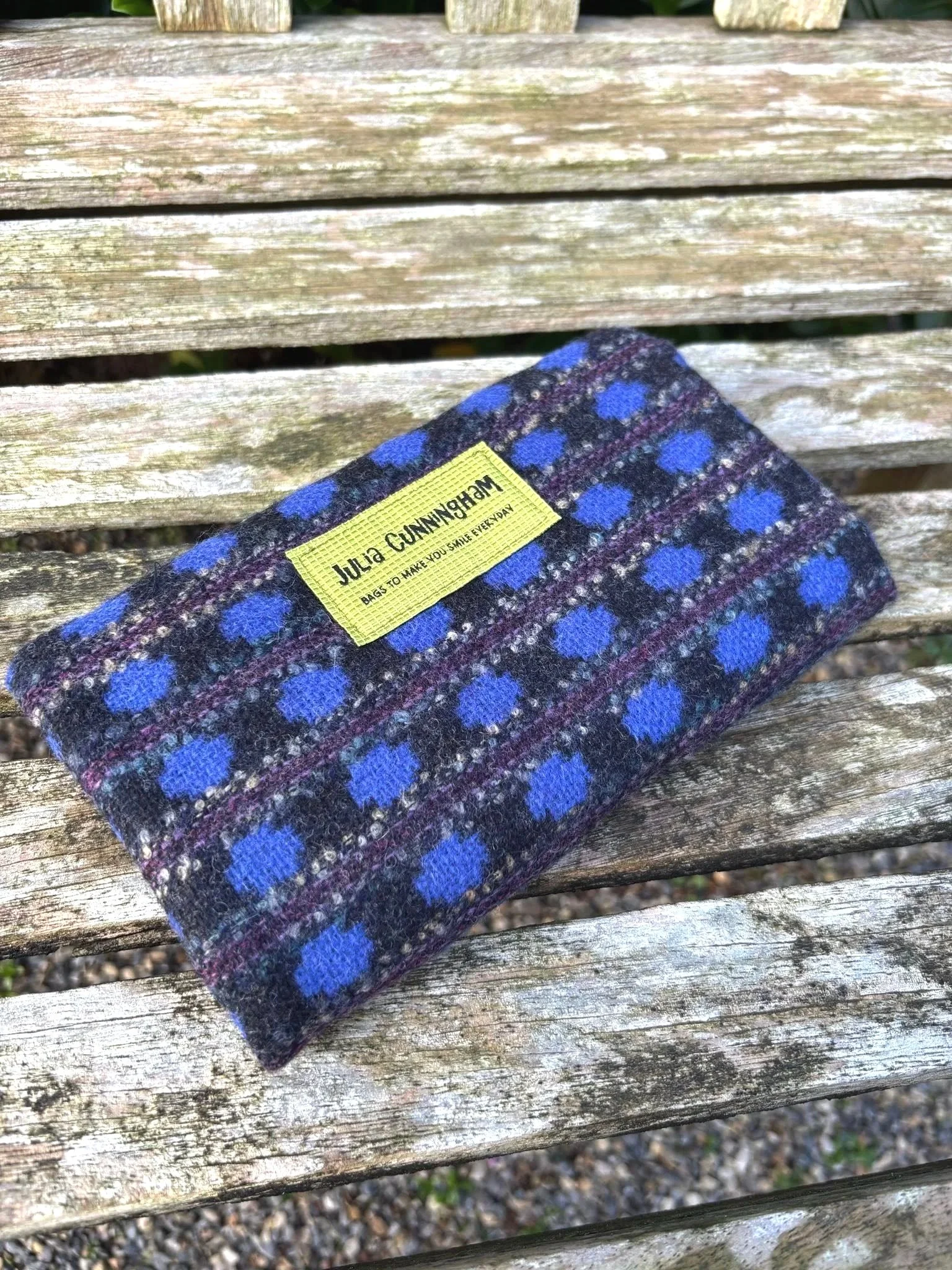 Back view of  Scottish purse and clutch bag in Blue Tweed  with Julia Cunningham brand