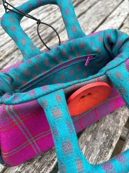 inside view of pink tartan handbag.jpg