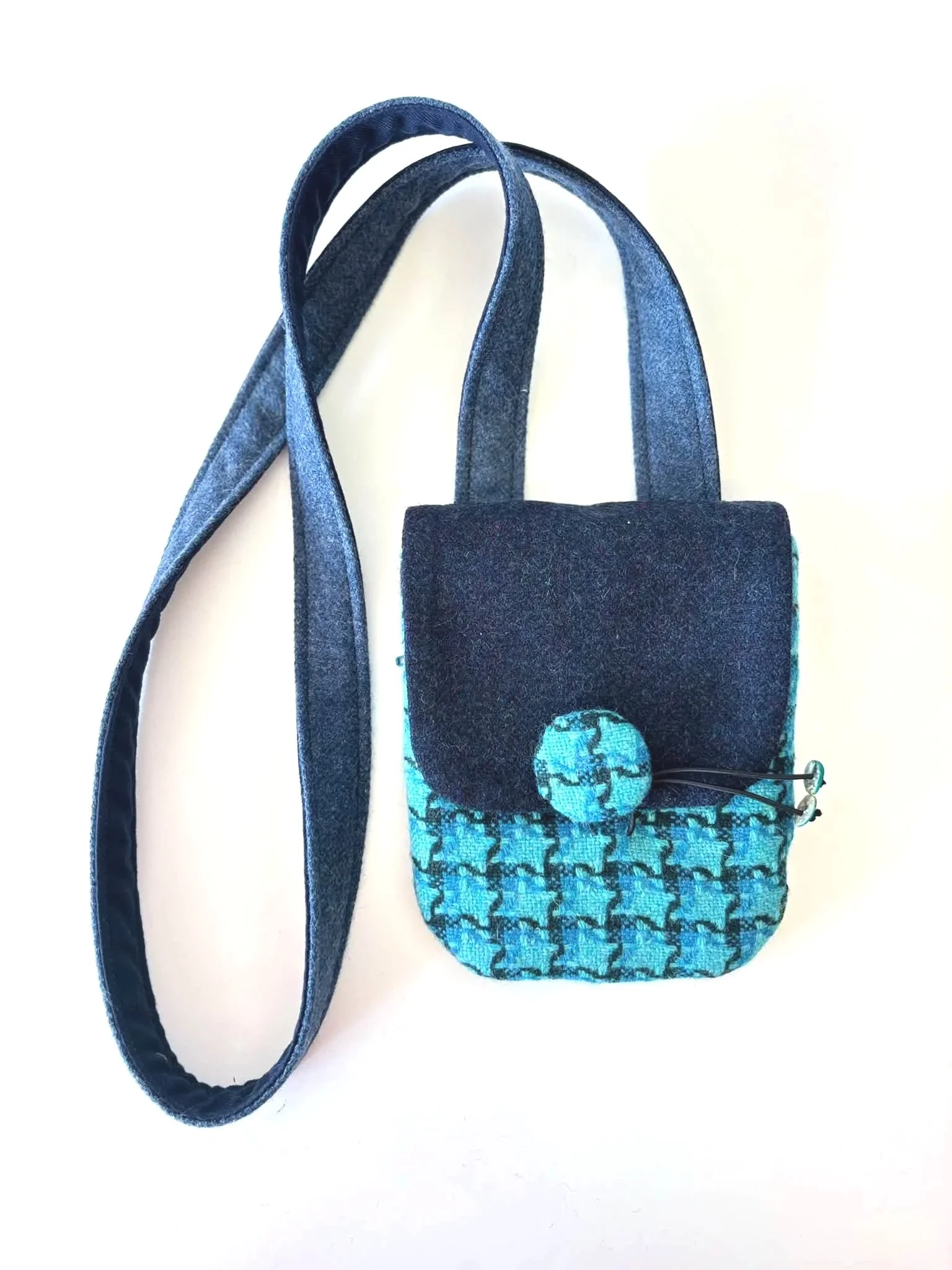 handmade blue tweed crossbody phone bag in Hinnigan tweeds with blue detailing by Julia Cunningham