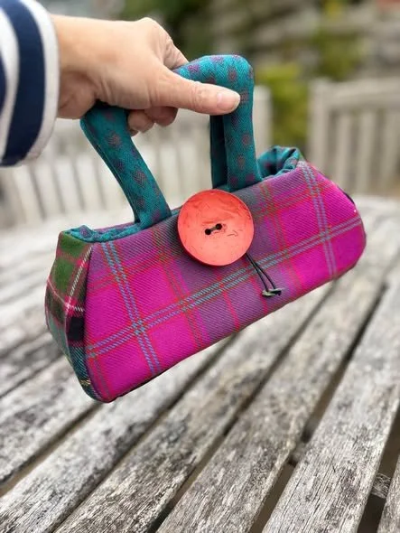 front View of pink wee fantoosh tartan handbag.jpg
