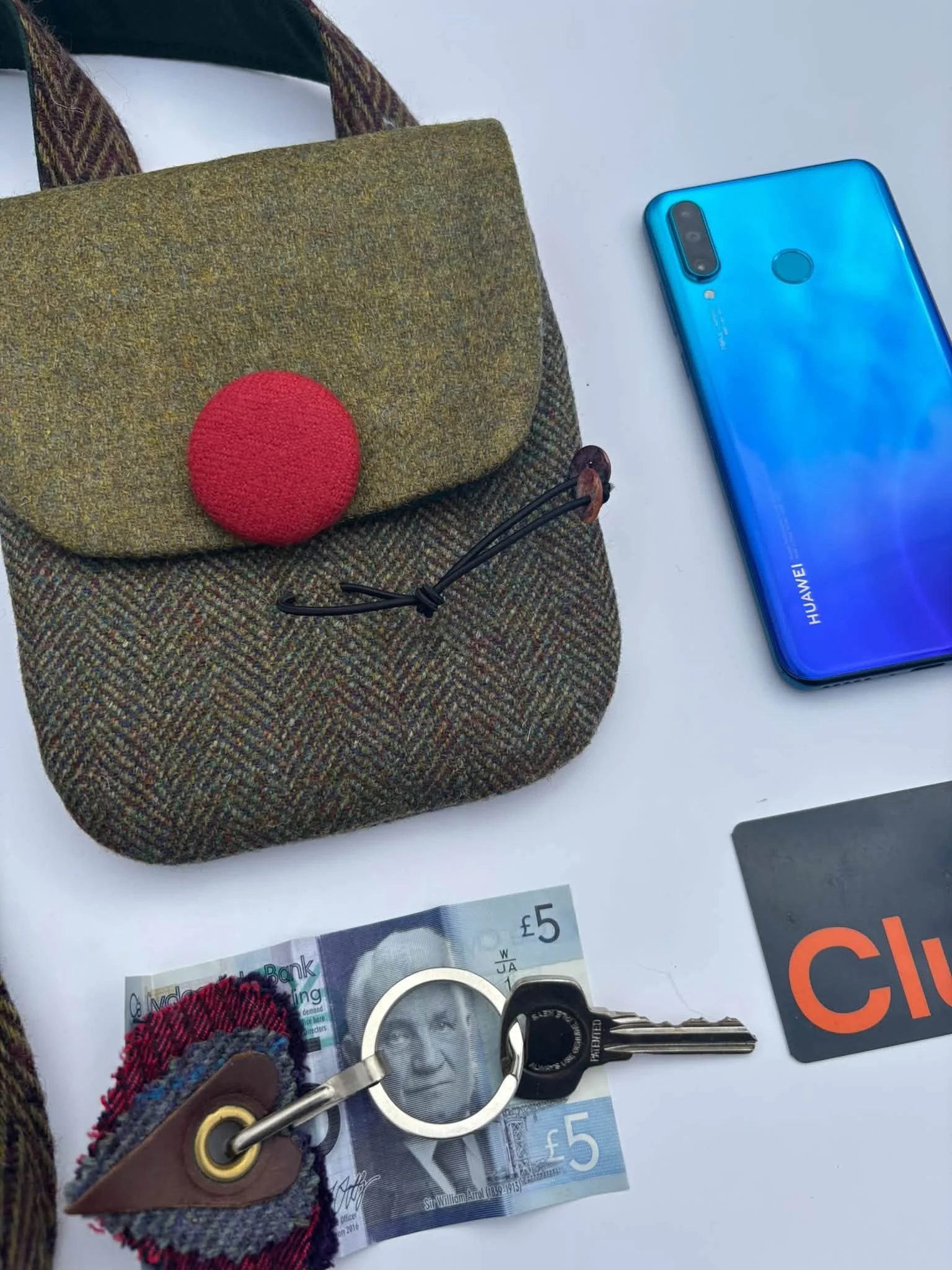 what can i get insode a tweed phone bag by Julia Cunningham.jpg
