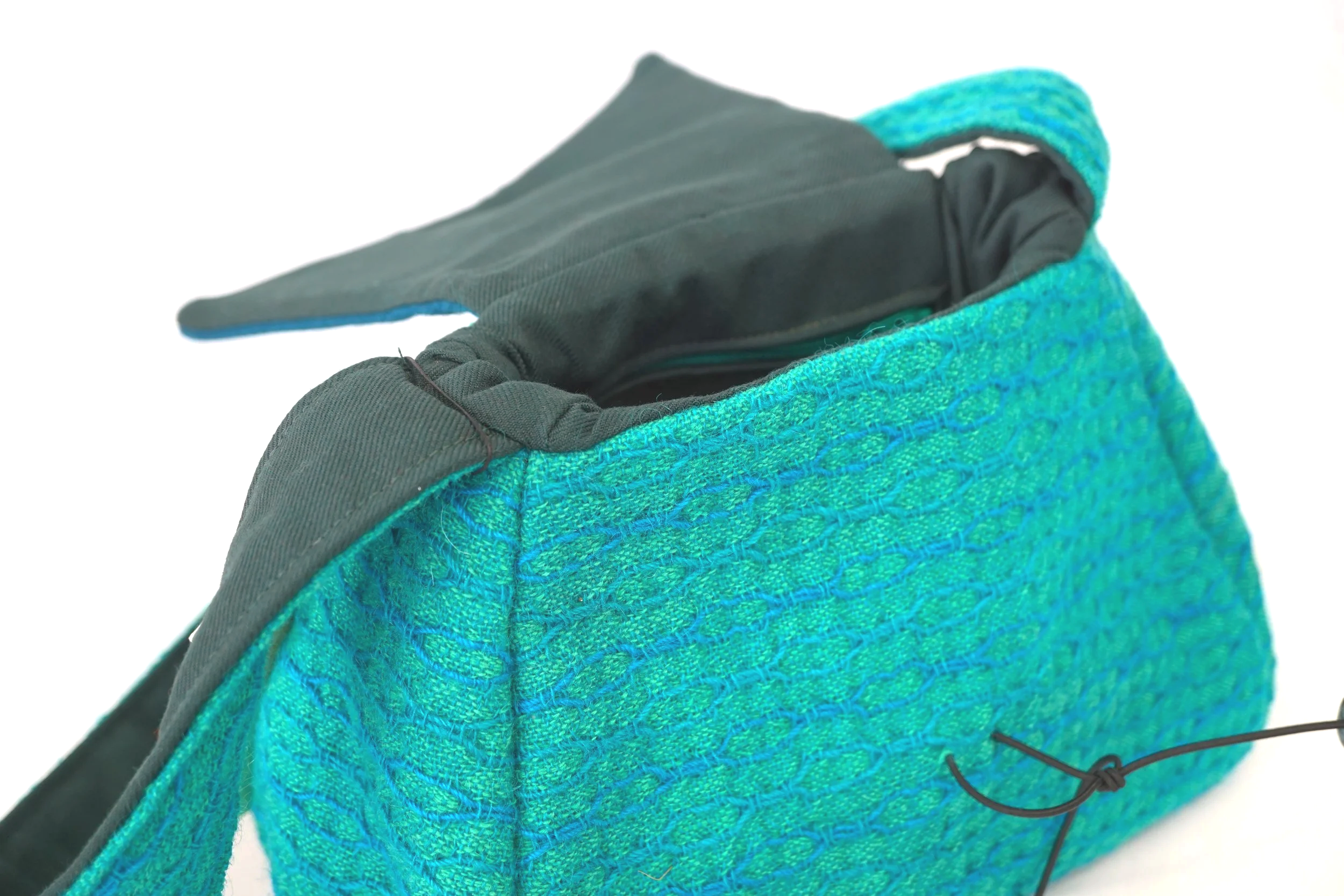 inside green tweed shoulder bag