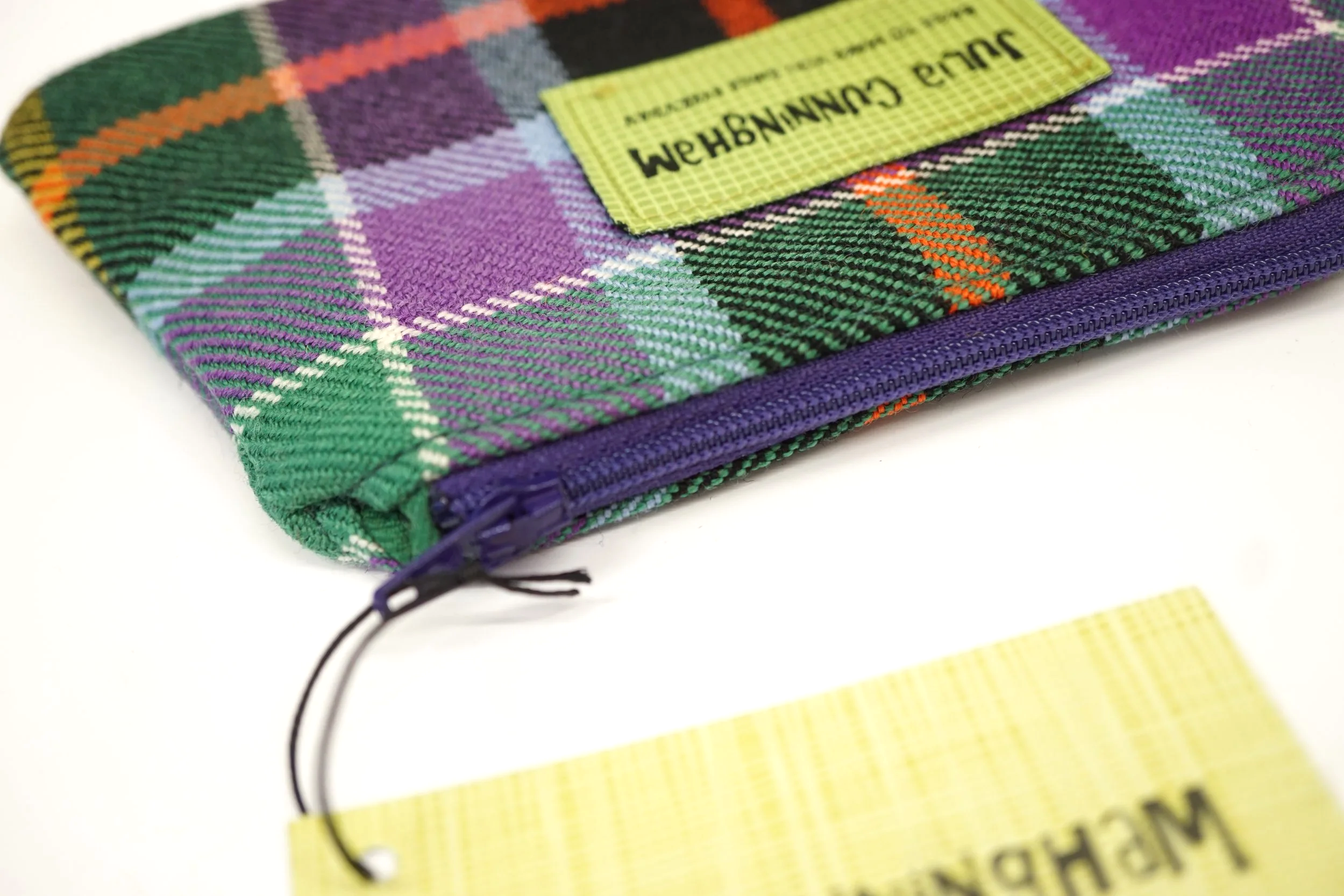 showing the zip detail on the Tartan zipped purse showing storage space for everyday essentials