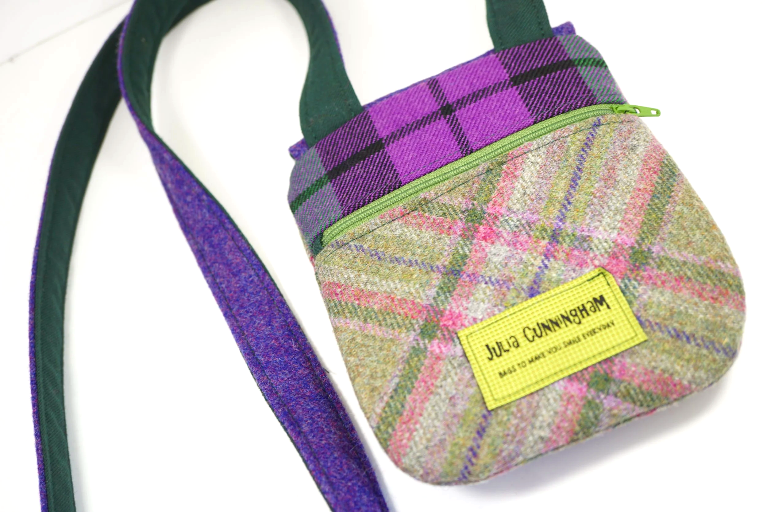 back view of the handmade Scottish cross body phone bag in green purple and pink