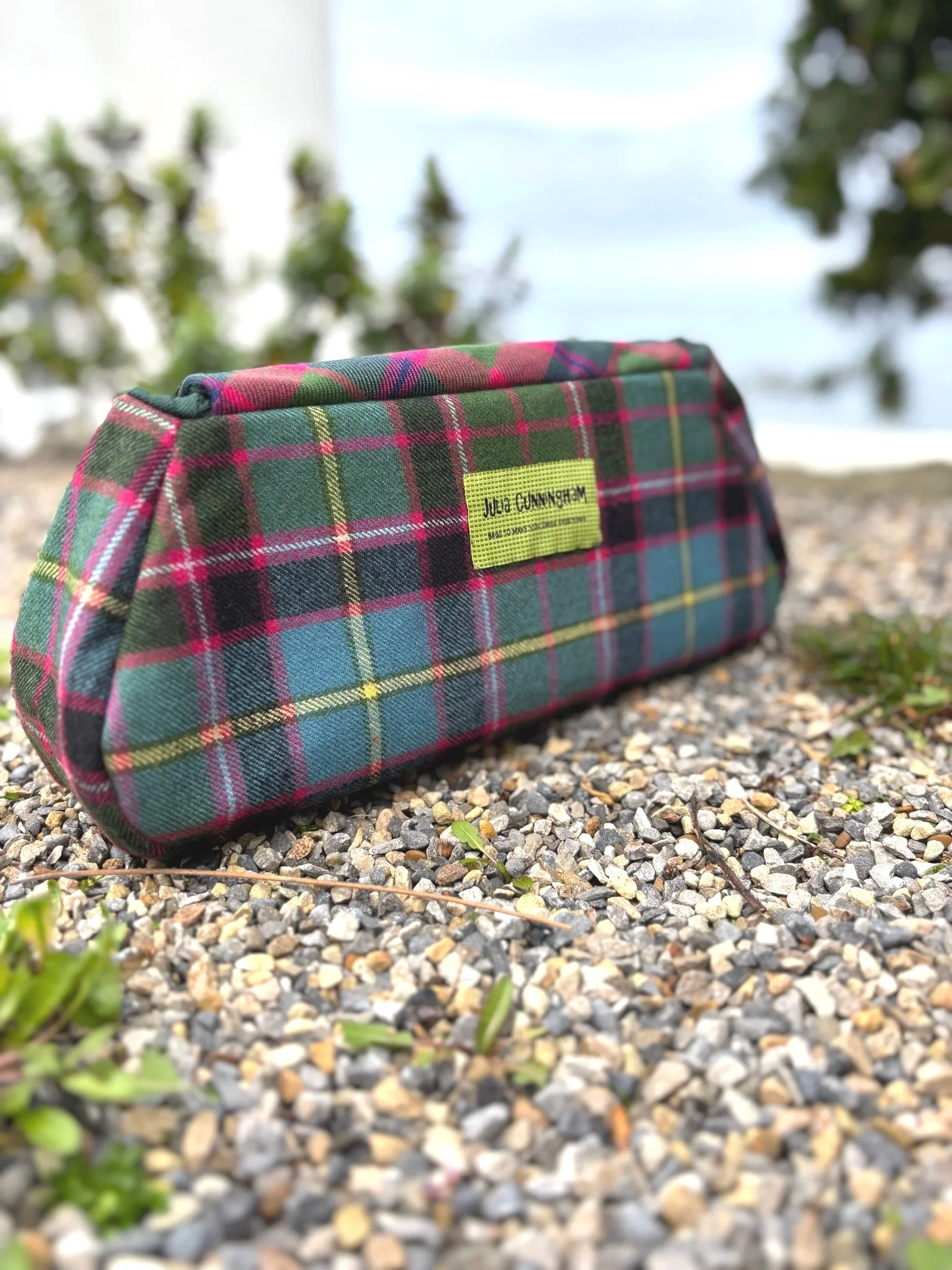 Back view of label detail on handmade Scottish Peerie Poak clutch bag by Julia Cunningham