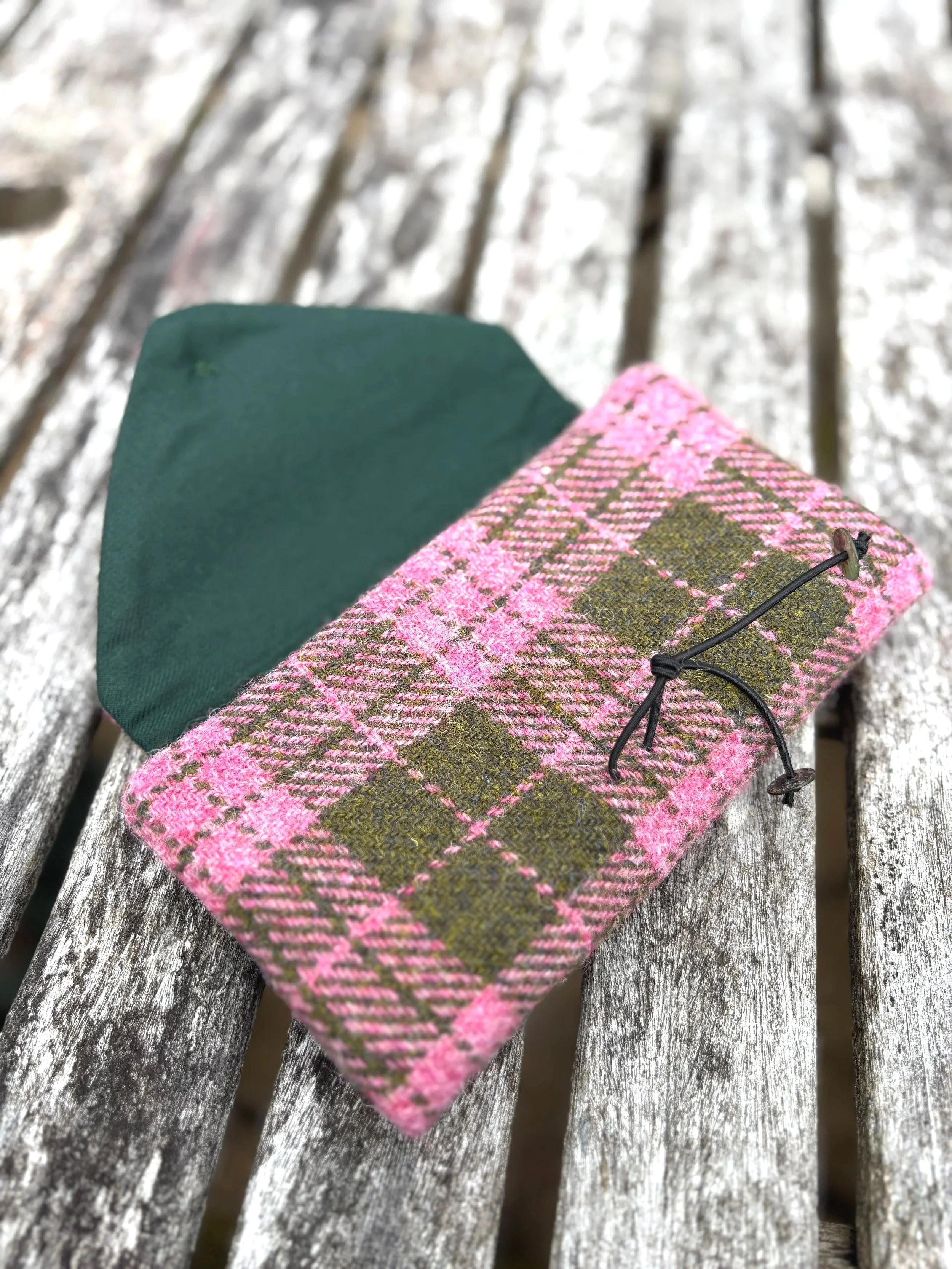 inside view of pink and olive Harris tweed cltuch bag