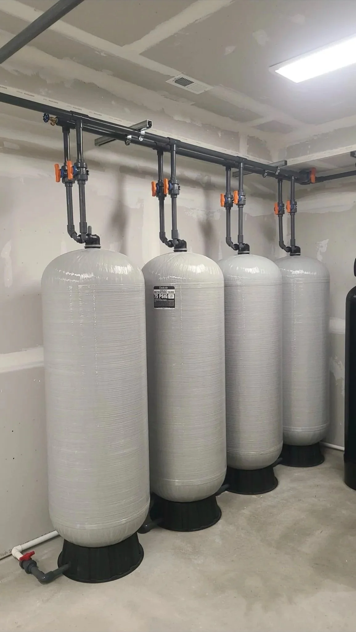 Multiple Novaline water treatment tanks installed for a San Antonio property