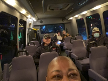 S Renee Jone, Gallery Manager at 6th on 7th Photography Workshop, taking a selfie with participants while on a TODCO resident field trip in Miss Daisy.