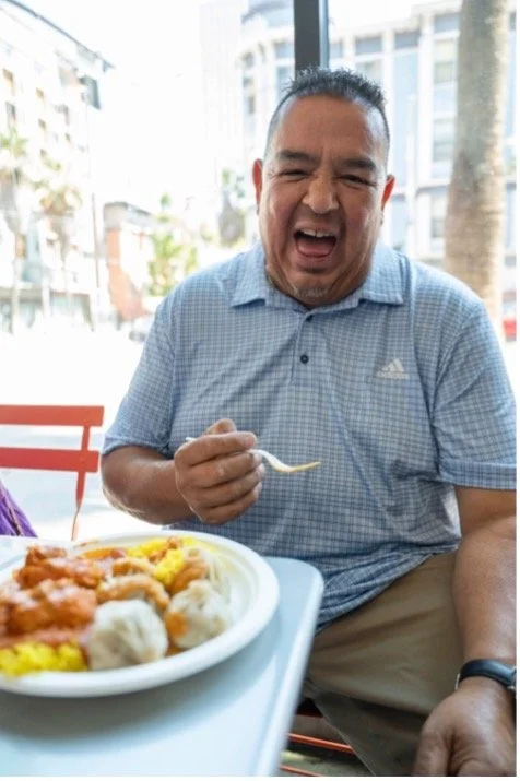 Danny Gonzalez, TODCO's transportation specialist, enjoying lunch at TODCO's quarterly staff birthday lunch outing in San Francisco, California.