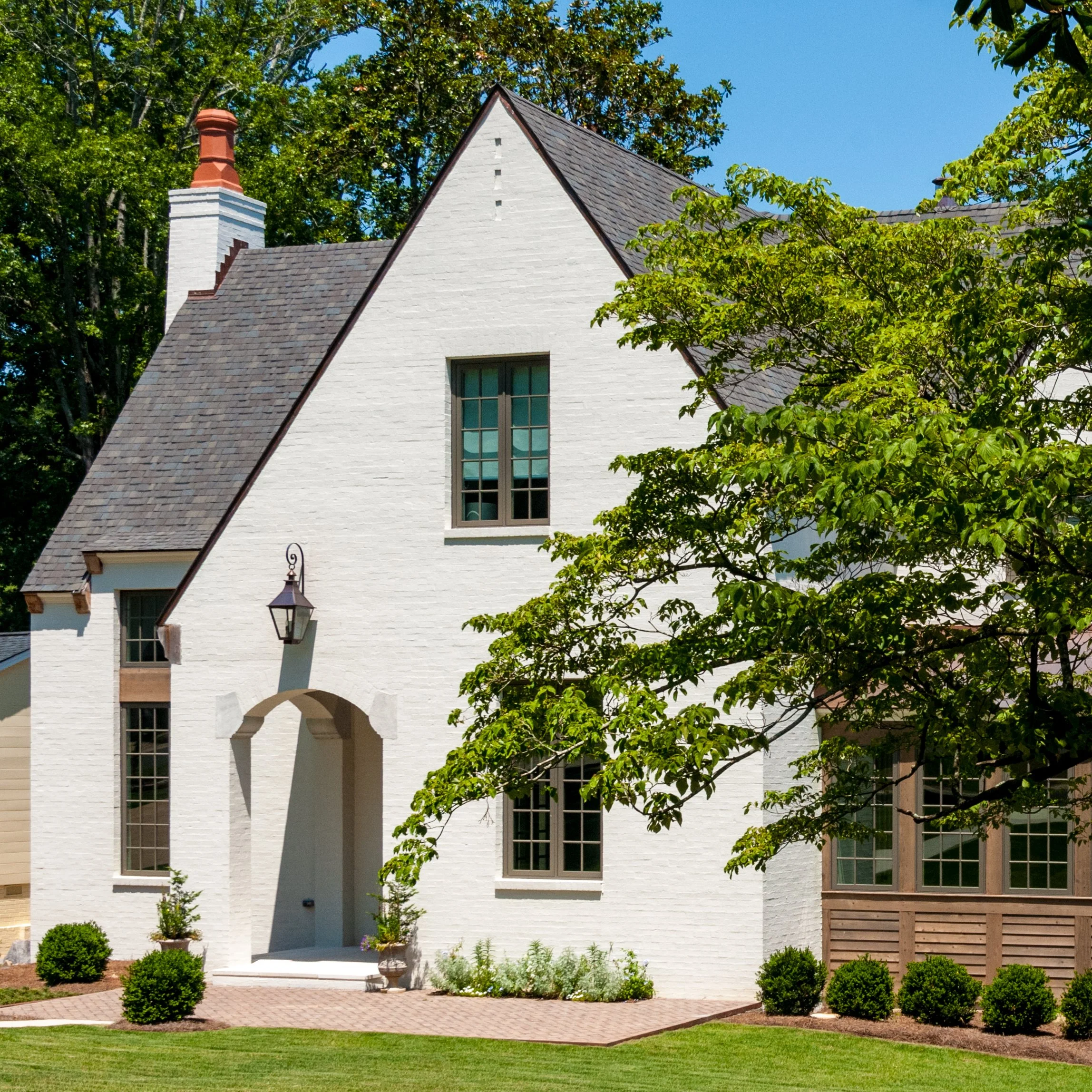 nash_circle_crestline_mountain_brook_alabama_new_residence_06_front_entry_porch_elevation_chimney_gable_painted_brick_2300.jpg