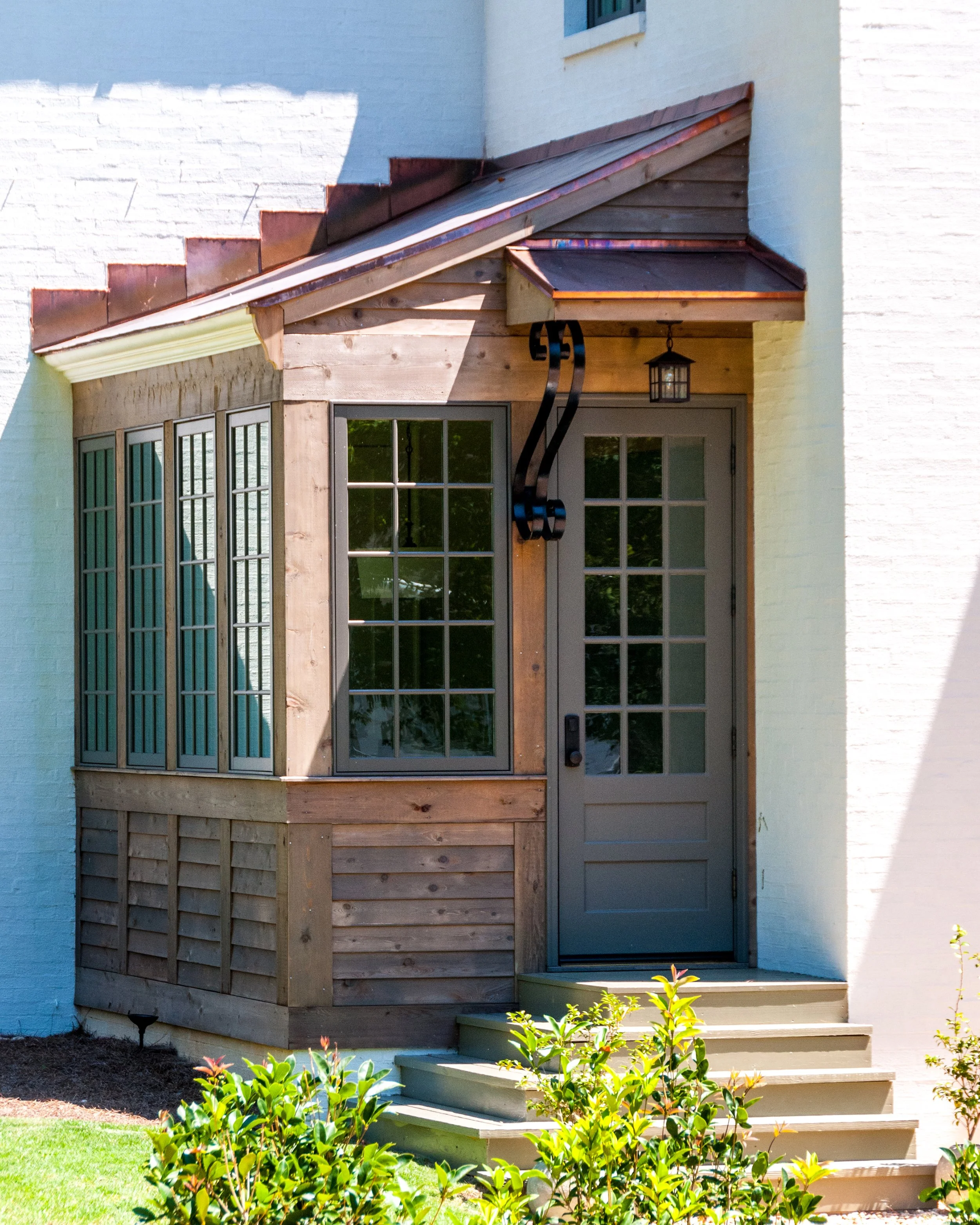 nash_circle_crestline_mountain_brook_alabama_new_residence_11_banquette_copper_bay_elevation_painted_brick_2500.jpg