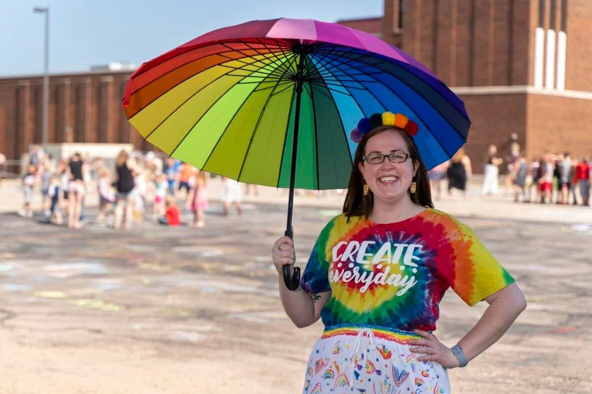 Award-winning art teacher Amy Greathead wears students' work