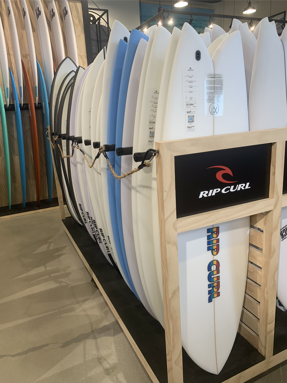 Surfcare QR Code stickers on new boards for sale at Rip Curl San Clemente. These QR Codes link to Surfcare’s website and let Surfcare know every time a Rip Curl Customer visits the site.