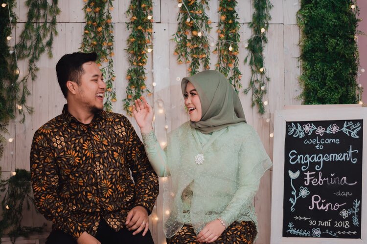 Couple laughing practicing communication skills learned in marriage counseling suwanee ga 30024 Couple laughing practicing communication skills learned in marriage counseling suwanee ga 30024