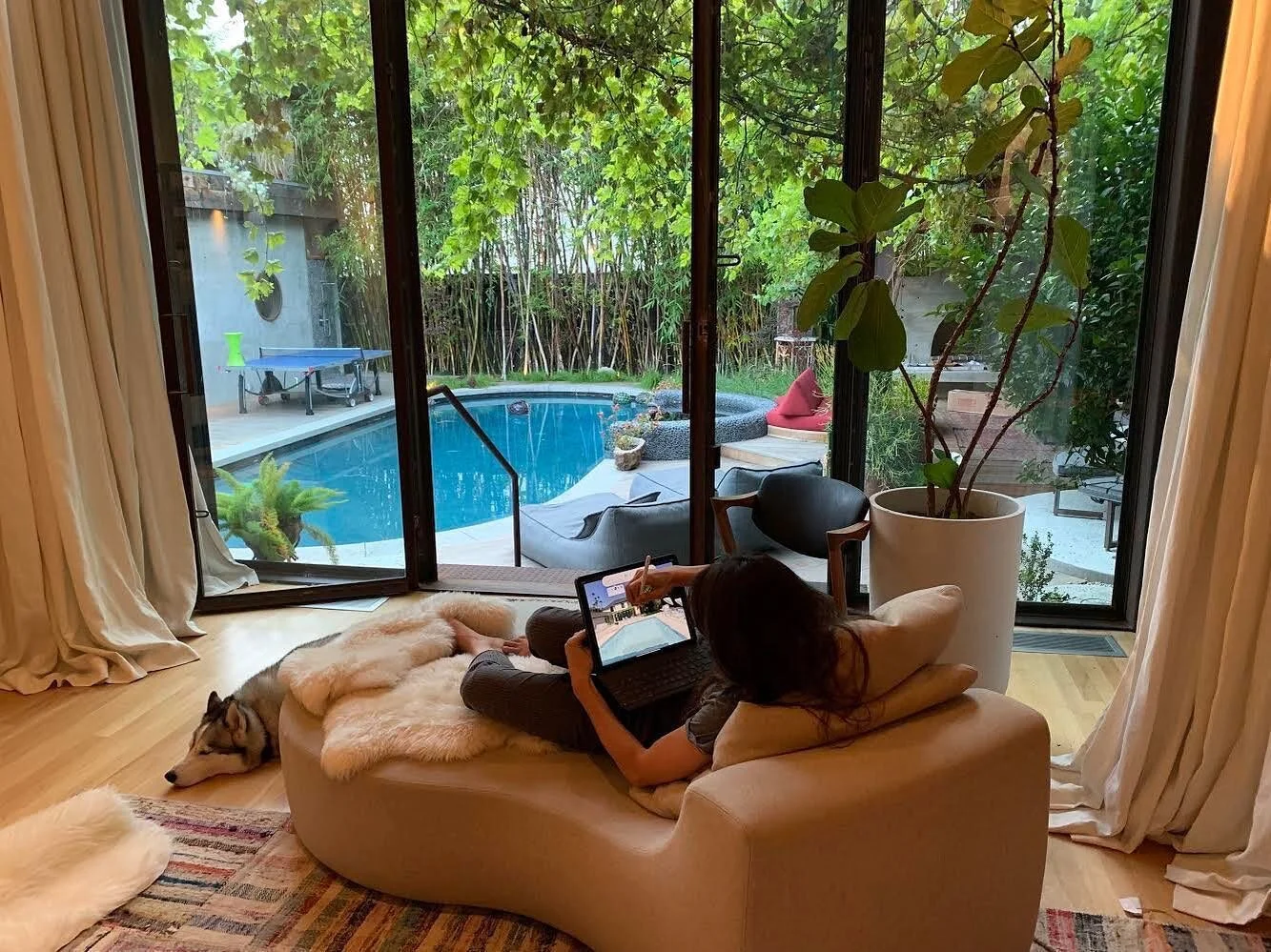 My assistant and I, taking advantage of this cozy nook with a lovely view, to sketch out a dreamy garden space for a client.  I like to move around from room to room as I design. Each space provides new feelings and inspirations to channel. #exterior