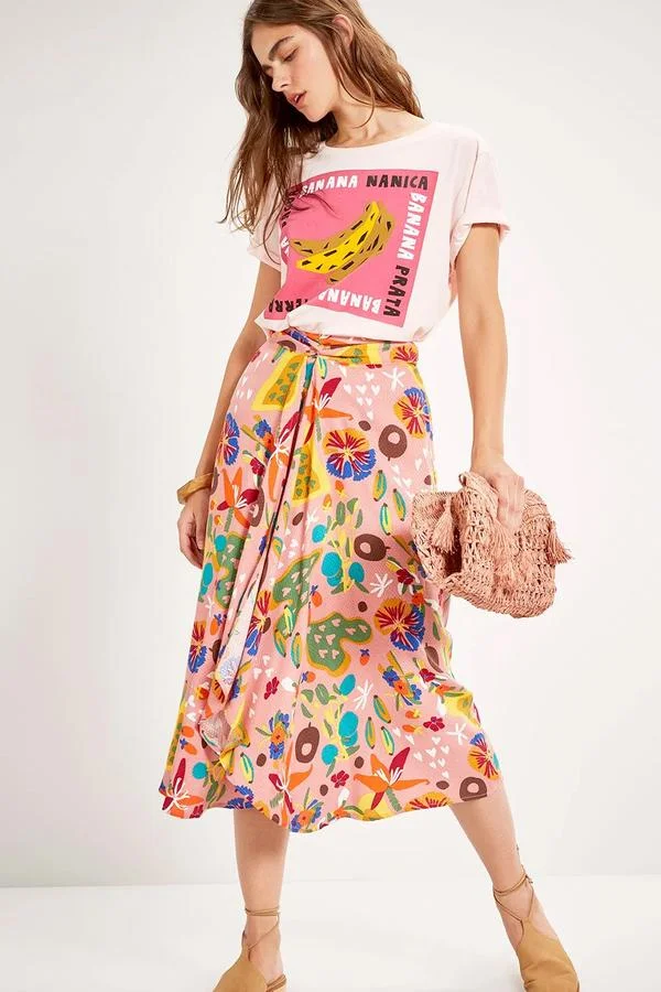 Feira Print Skirt A midi skirt with fruity succulent prints for added flare. This skirt is perfect for the upcoming spring and summertime!