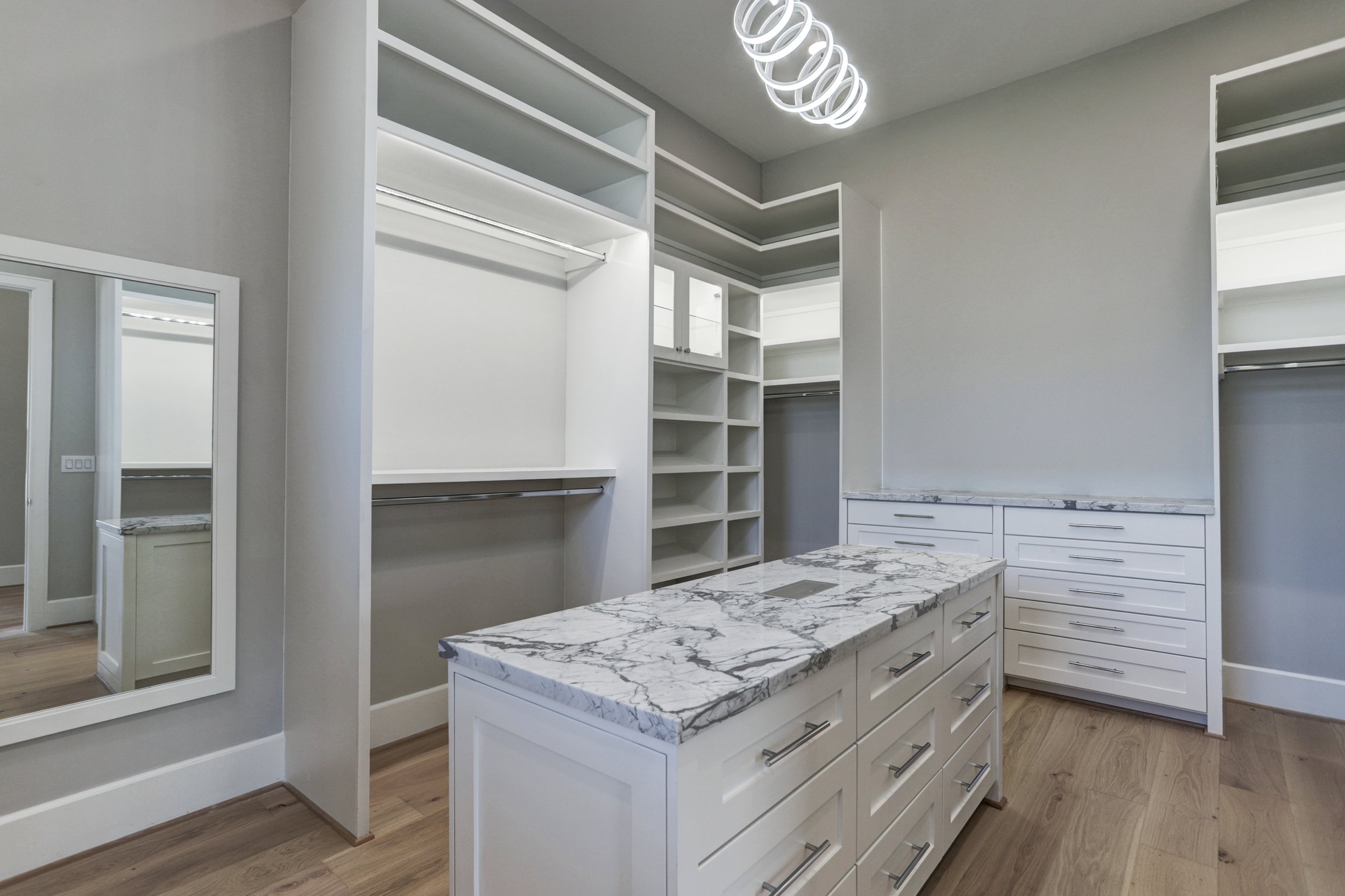 Here are some additional tips for transforming a spare bedroom into a walk-in closet: