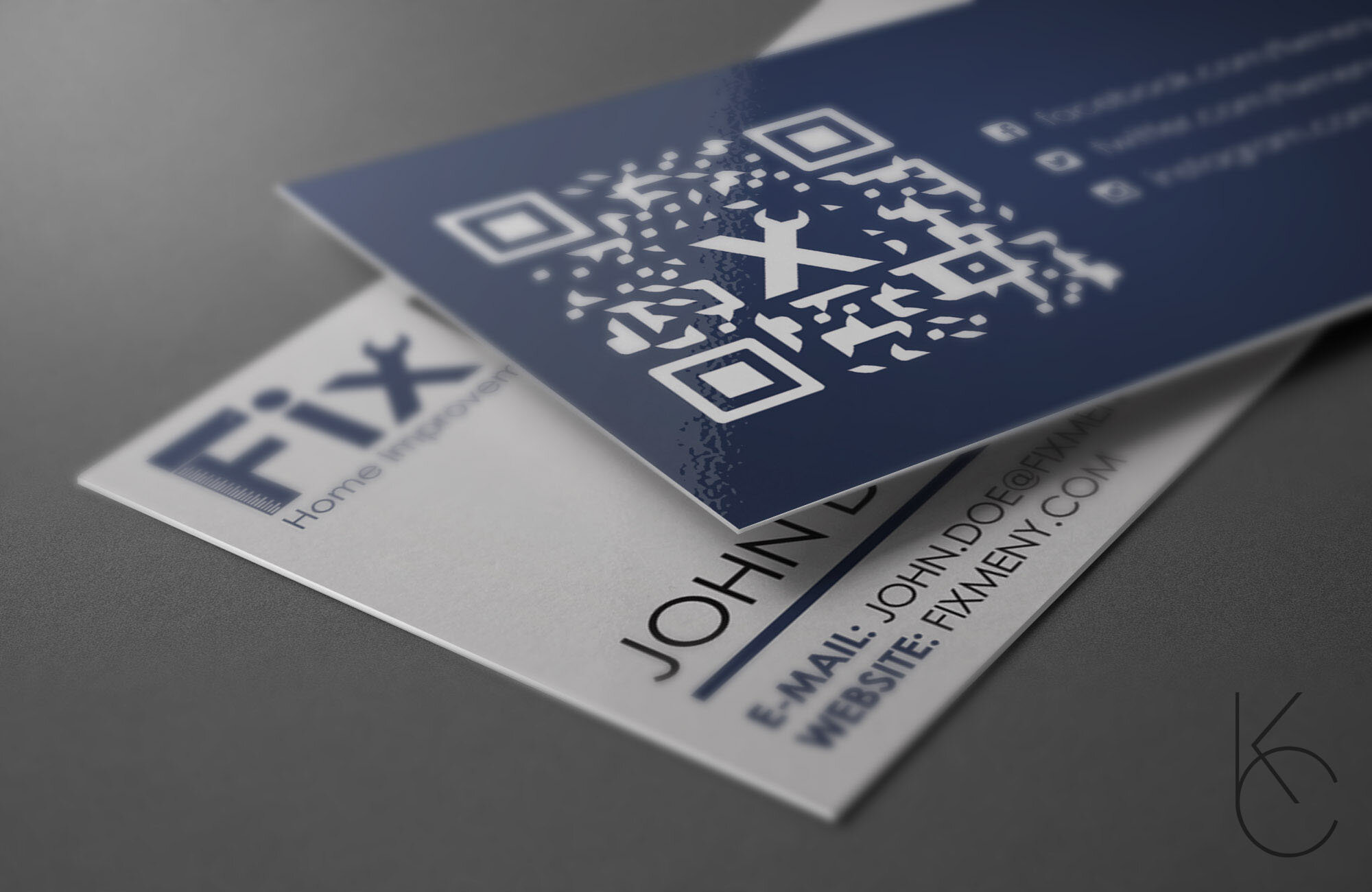 The first version of the business card design made use of the company logo's colors, including a QR code on the back of the card.