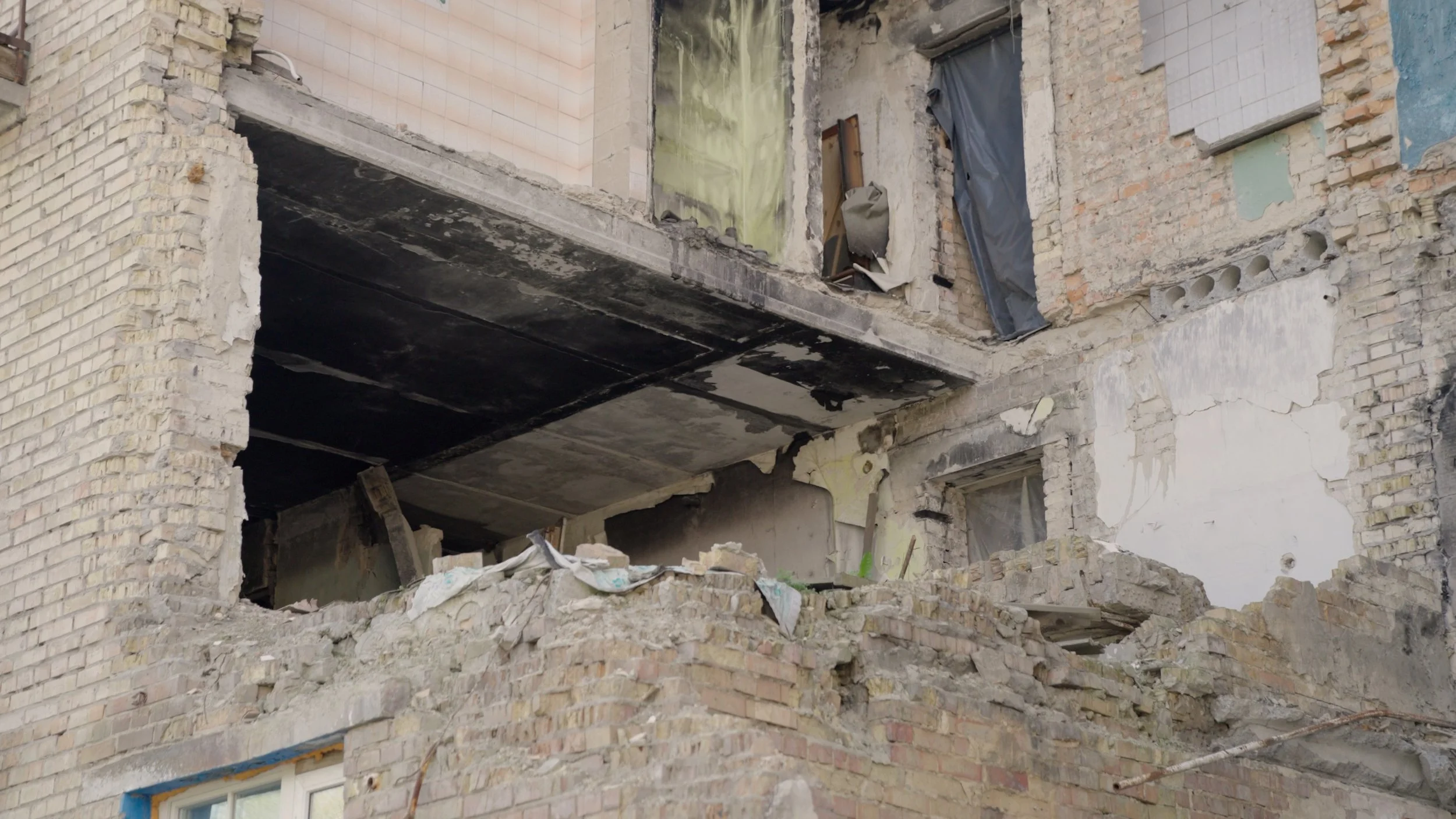 In Bucha, a city made infamous by wartime atrocities, IOM supports recovery efforts—repairing housing, restoring utilities, and helping families return.