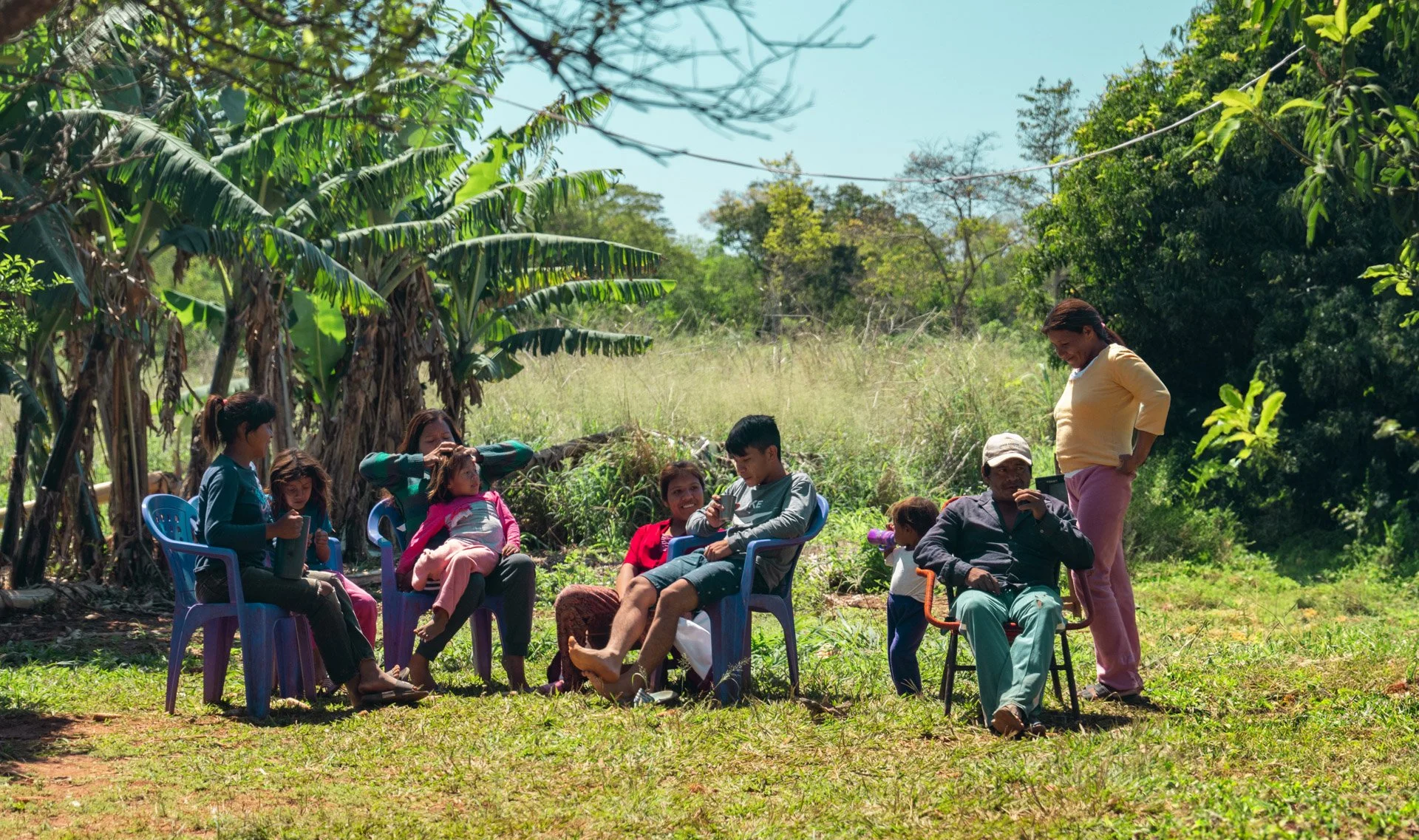 Ramona in a garden with her family.