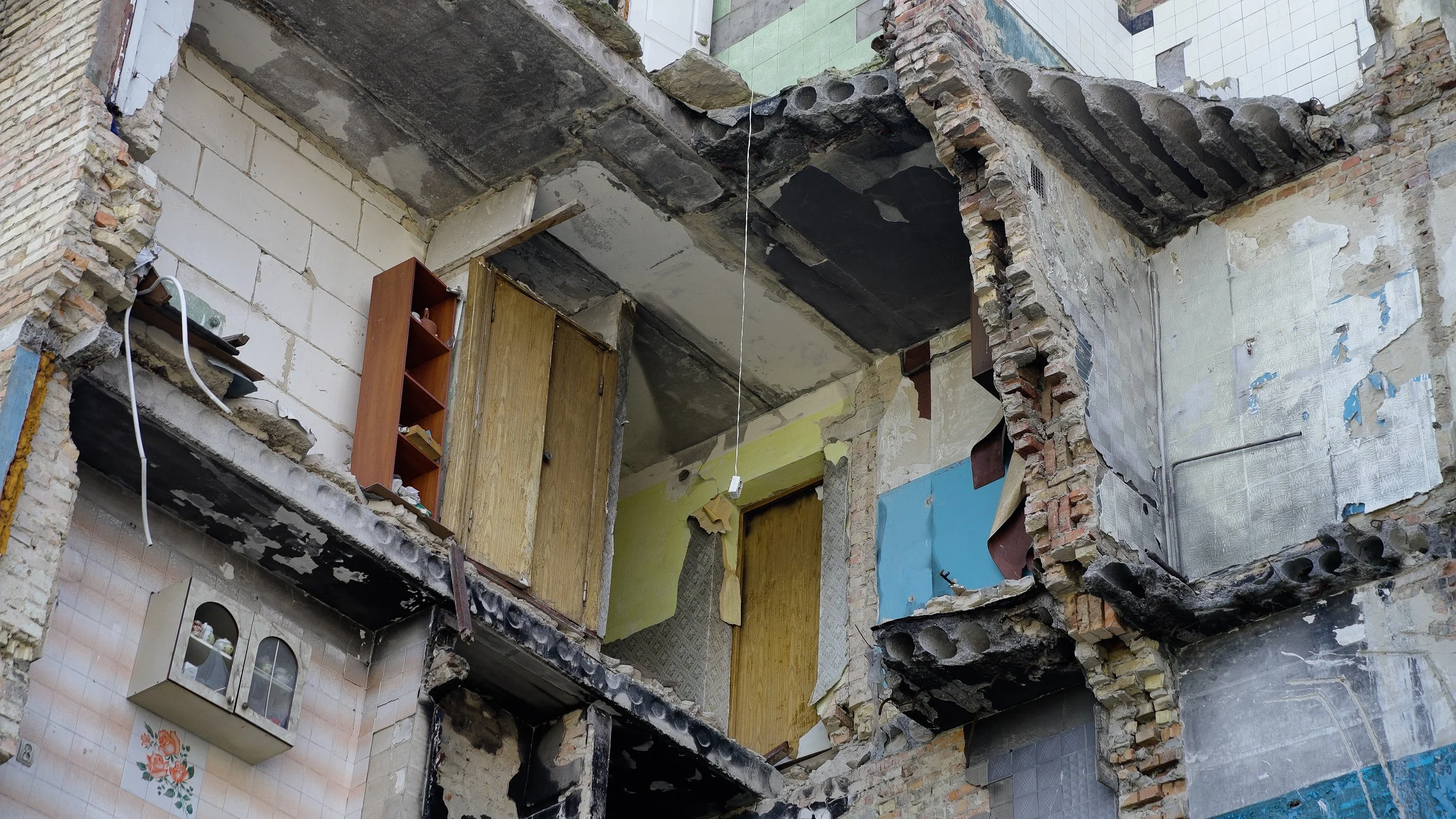 In Bucha, a city made infamous by wartime atrocities, IOM supports recovery efforts—repairing housing, restoring utilities, and helping families return.