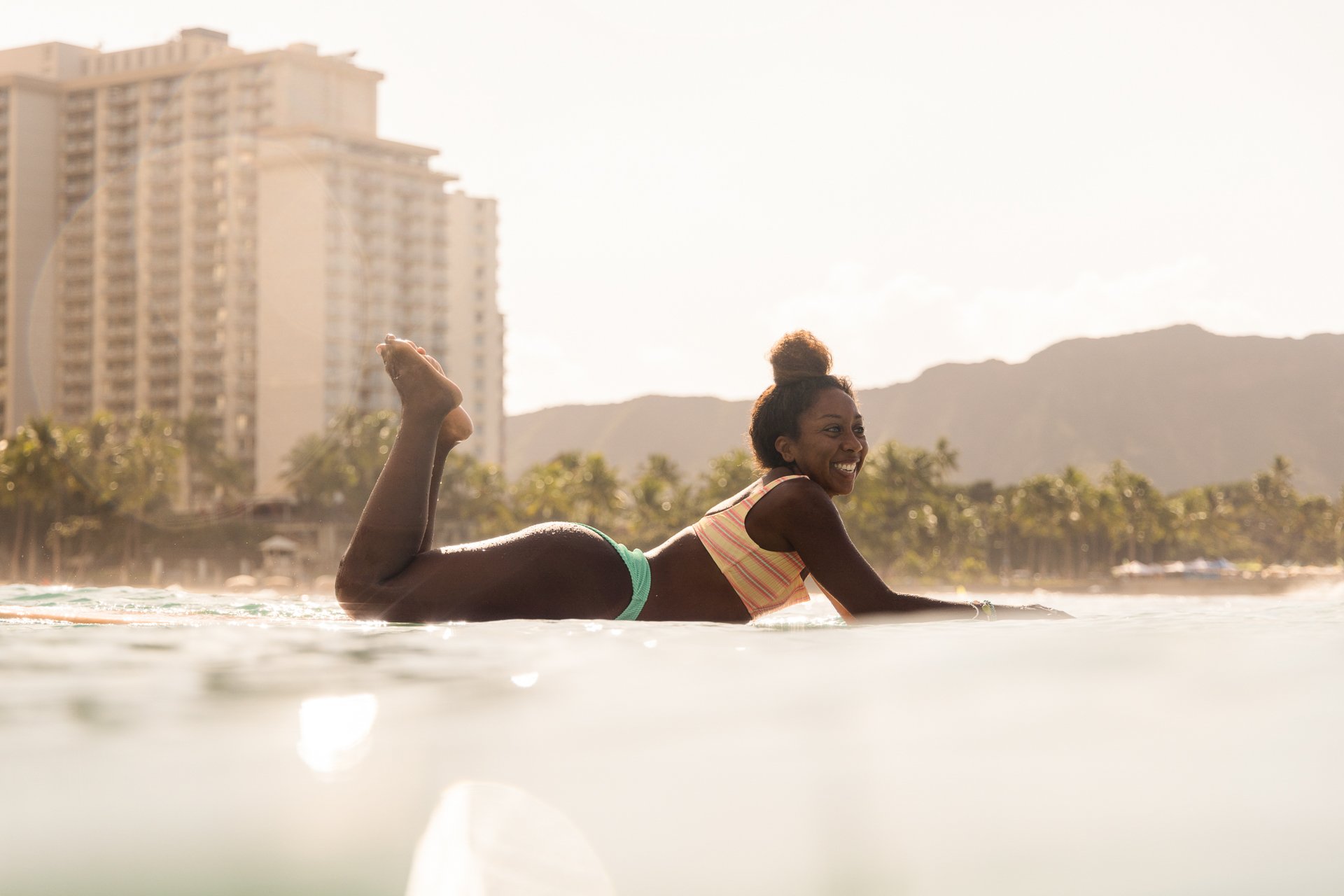 Afro-Latina Surfer Nique Miller shot for Billabong Womens by female surf photographer Sarah Lee in Waikiki