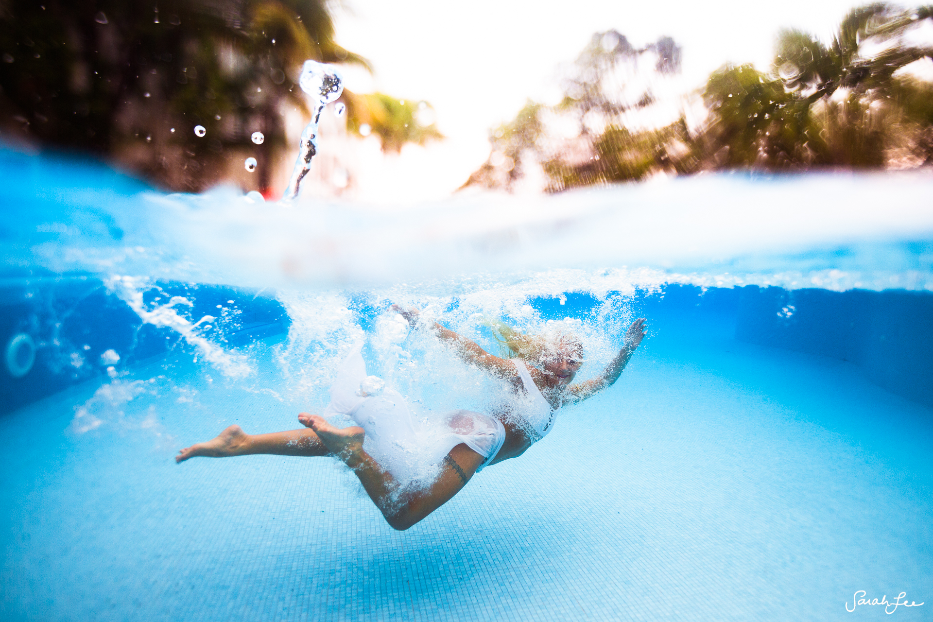  Shooting with the Outex in a pool can be so much fun! This was taken on a wide angle lens + flat port. See how the model is in focus as well as the rain drop! 