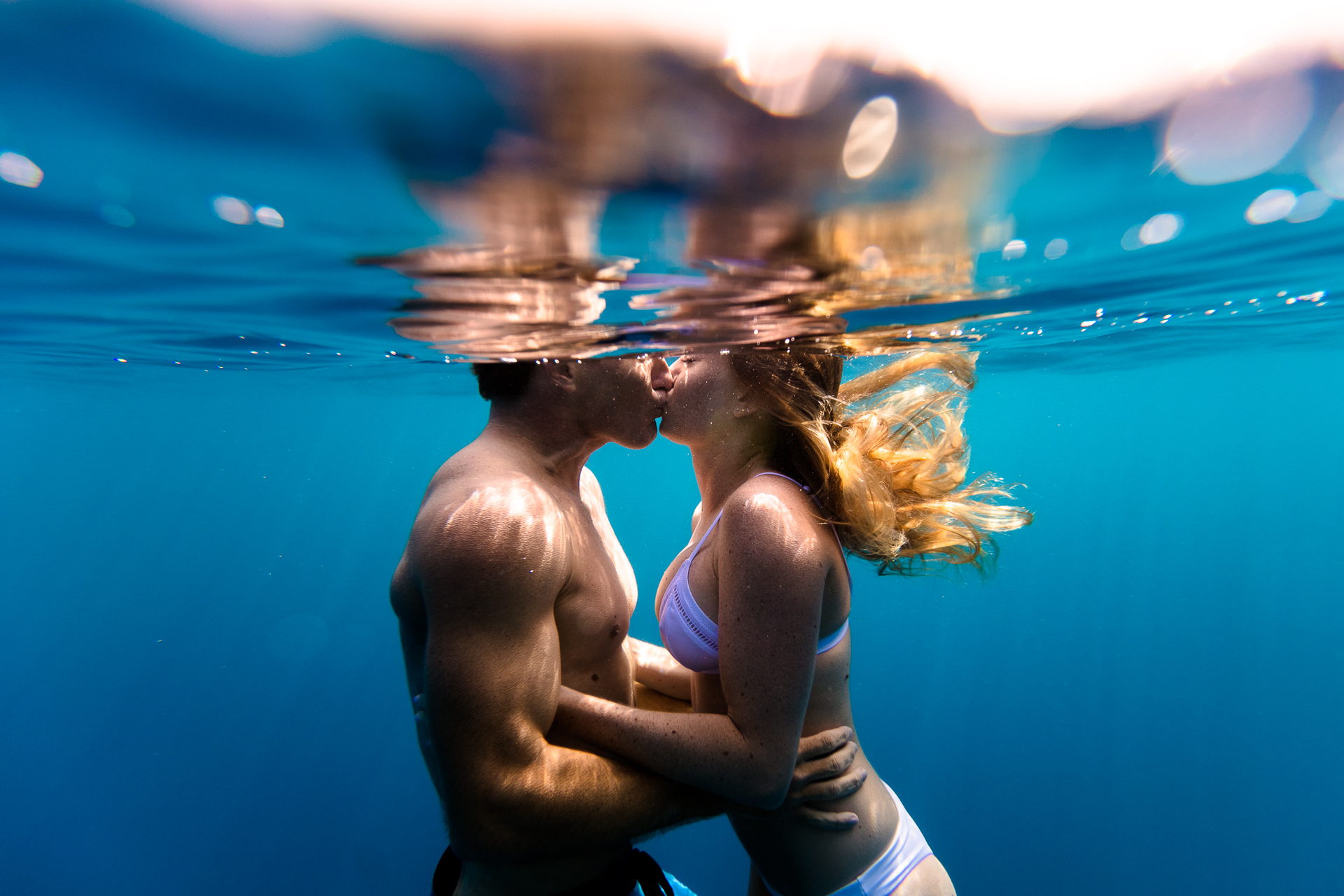  Underwater Engagement Photo Session. Taken with the clear Outex Camera Cover + Flat glass port on a Canon 5D MKIV + Canon 16-35mm f/2.8 wide angle lens. 
