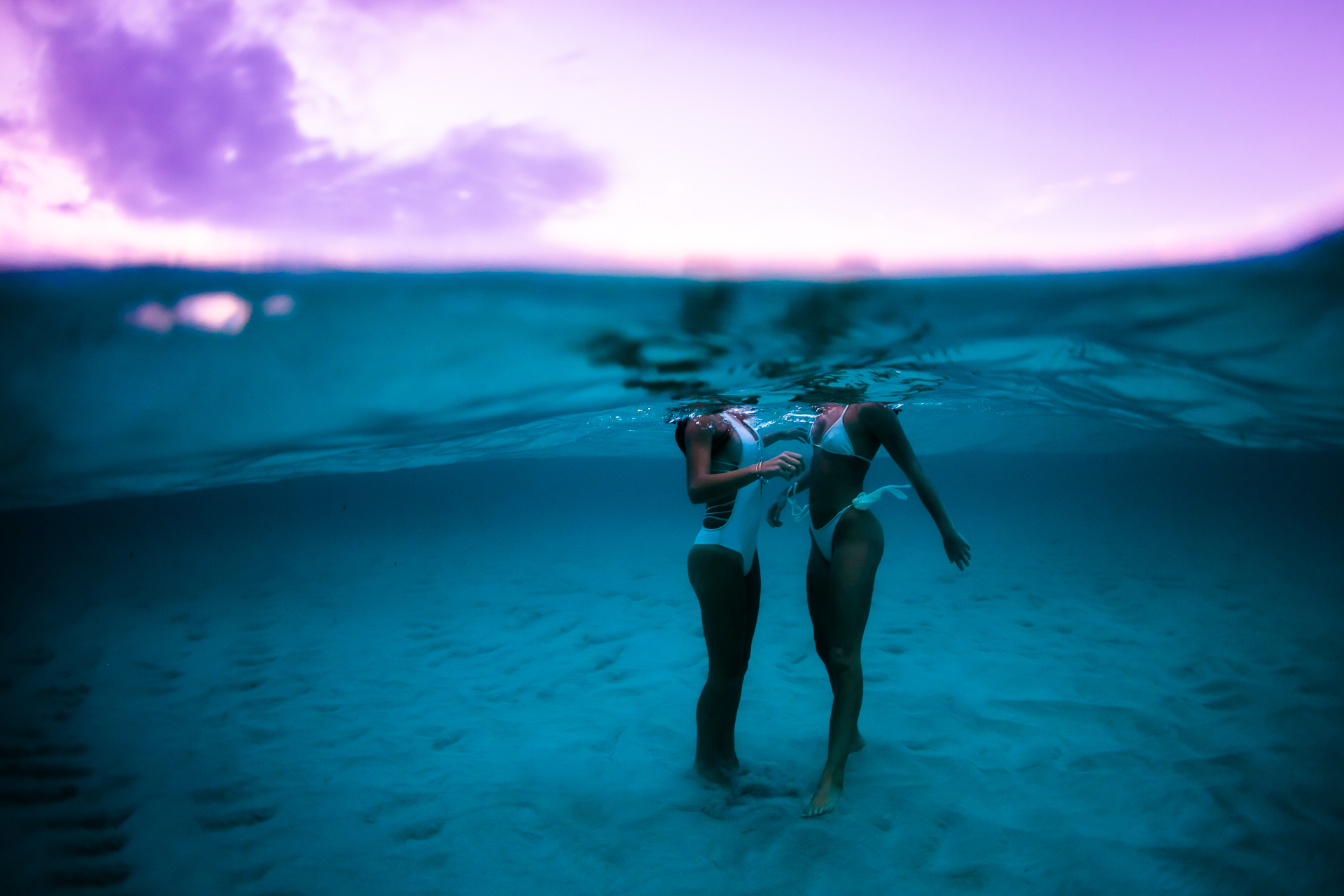 Split-level shot taken with a Canon 5D MKIV + Canon 8-16mm f/4 fisheye lens in the clear Outex water housing + dome lens.