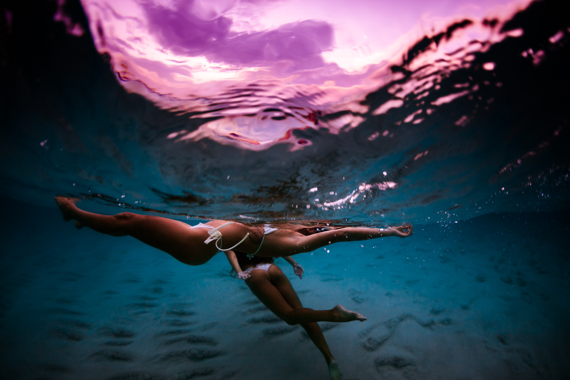 Split-level shot taken with a Canon 5D MKIV + Canon 8-16mm f/4 fisheye lens in the clear Outex water housing + dome lens.