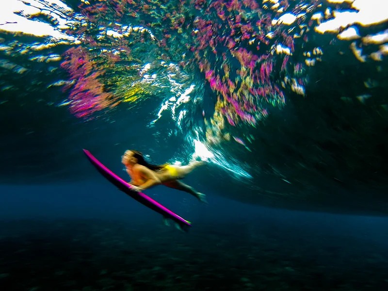 This photograph was taken at sunset with a GoPro Hero 2 on Burst Mode. The automatic shutter speed of the GoPro created this motion blur effect in camera!