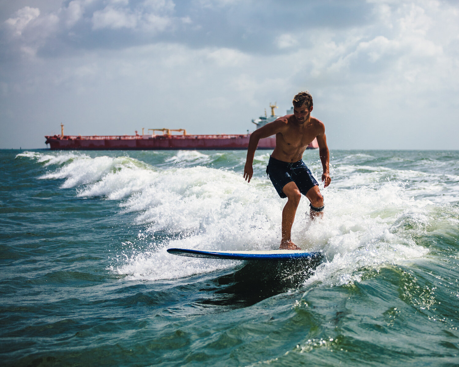 Kevin Skvarna tanker surfing in Texas for BIRDWELL BEACH BRITCHES