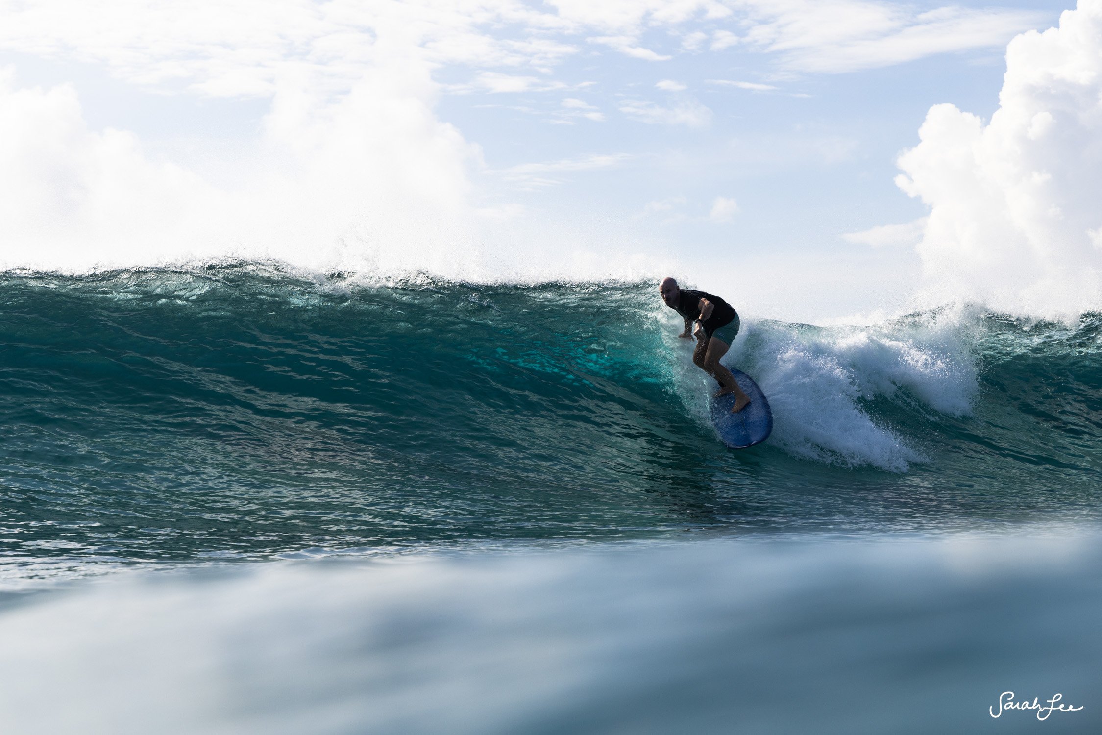 Surfing a Channel Islands Mid Pin 7'5 in the Maldives.