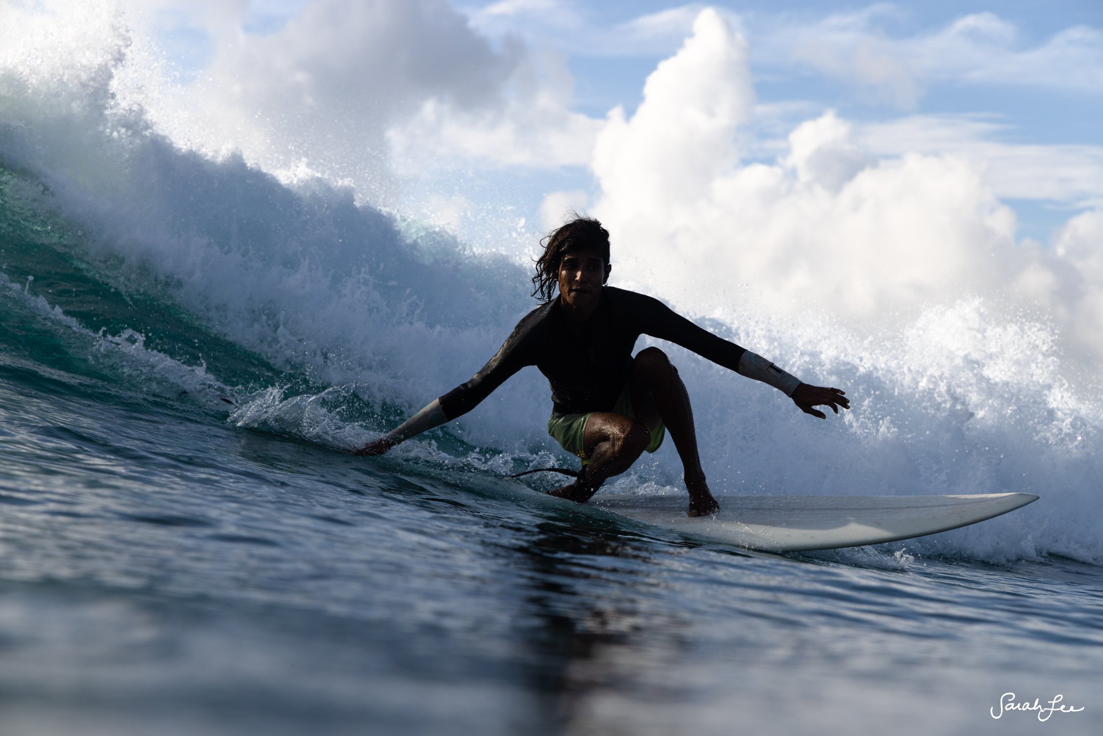 Local maldivian female surfer, Annu