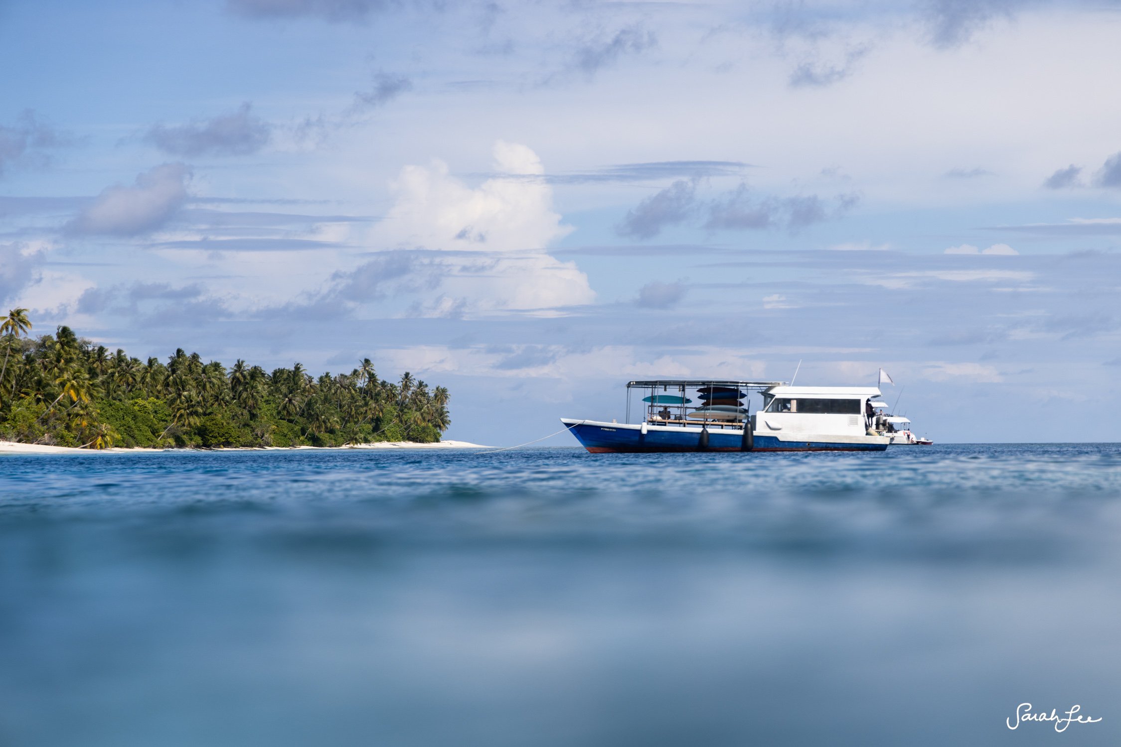 Surfing in the Central Maldivian Atolls.